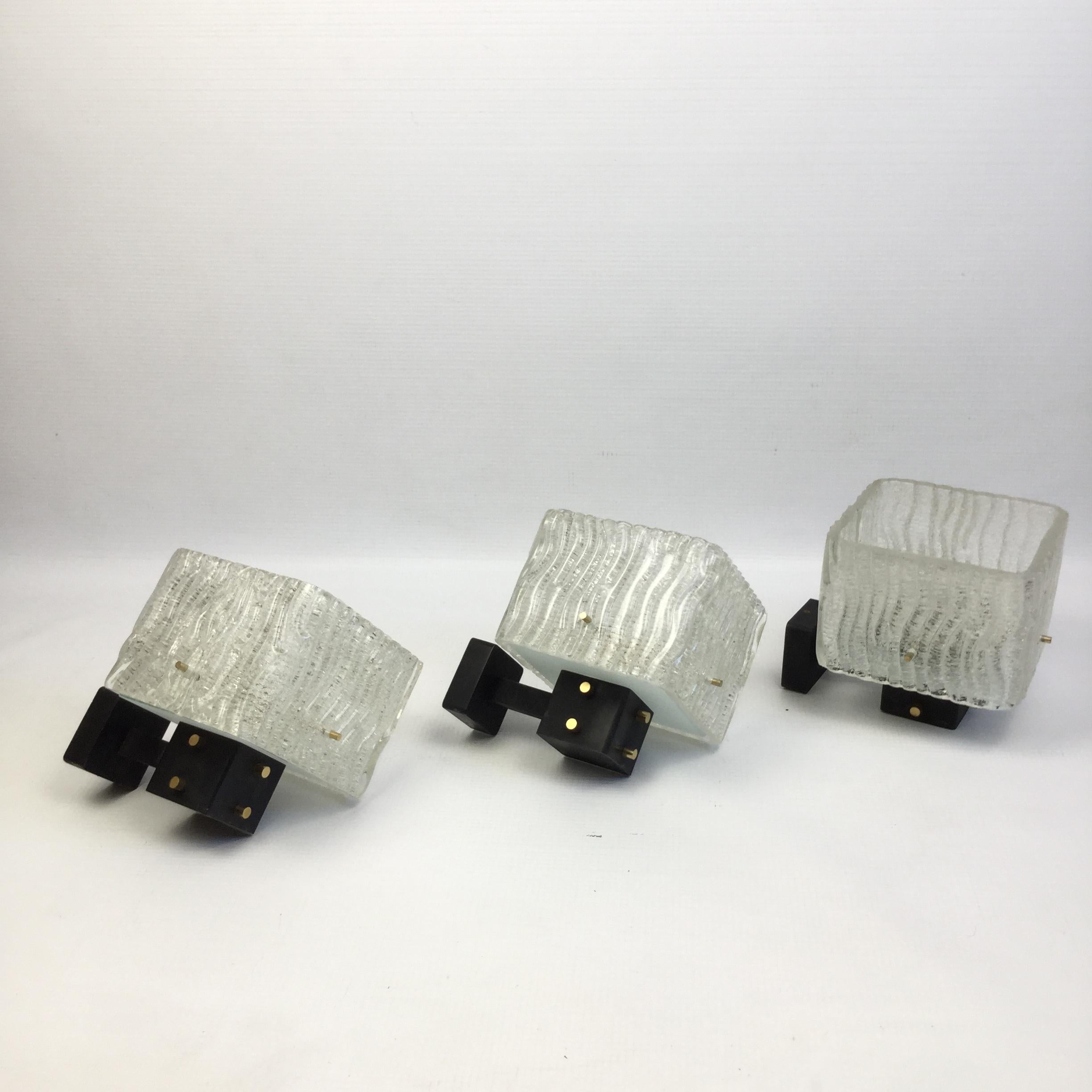 Set of 3 Maison Arlus sconces with black paint metal frame and textured thick glass squares.
Dimension glass shade:
15cm/15cm
Completely rewired.