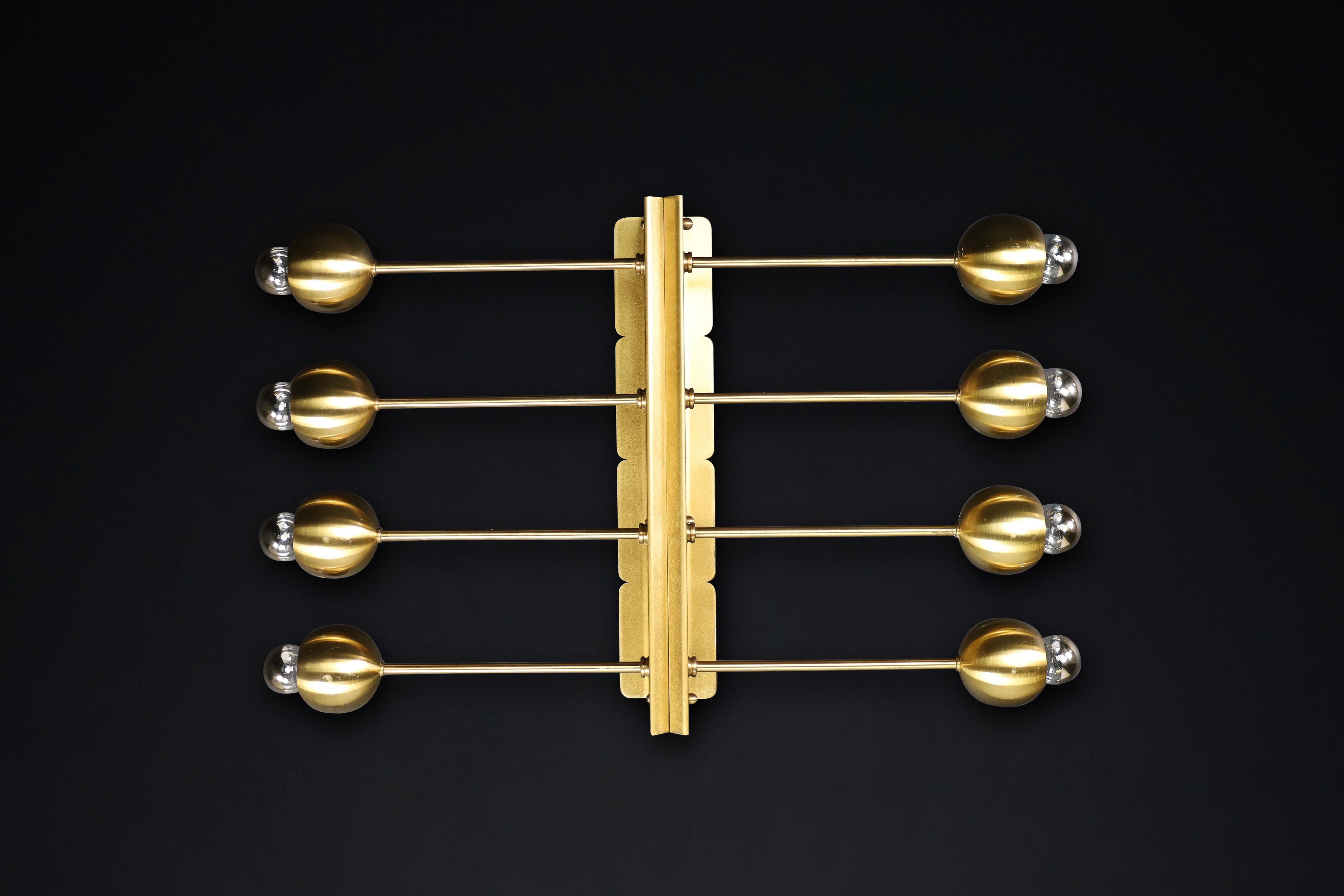 Midcentury Wall Lights in Brass Italy 1960s

This is a set of wall lights/sconces/ceiling lights with brass fixtures produced and designed in Italy during the 1960s. The lights feature a beautiful fixture constructed of elegantly shaped brass