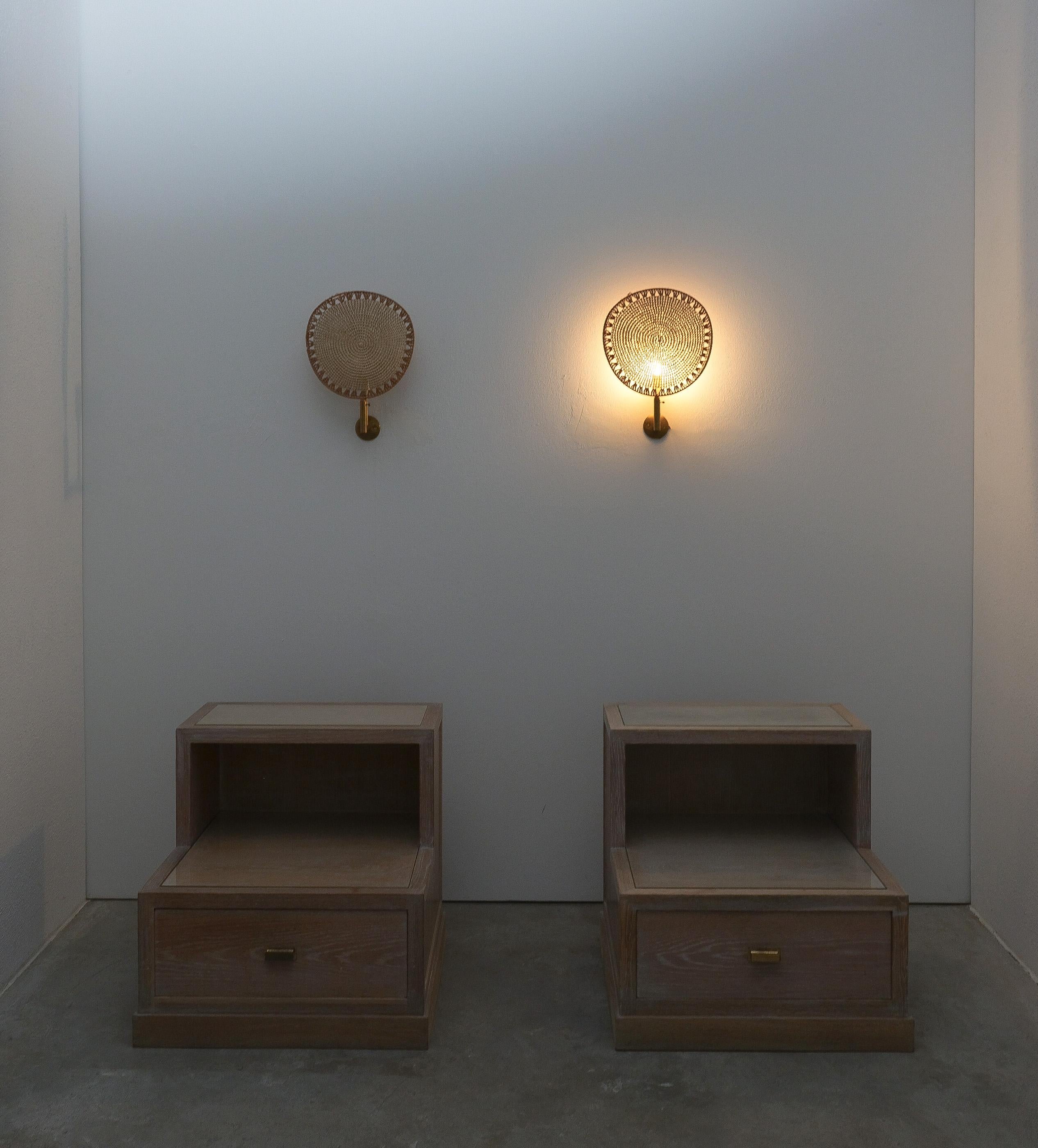 Mid Century Wall Lights Sconces (one pair) Hemp Paper Uchiwa Style Ingo Maurer

Nice set of  woven hemp paper uchiwa shades in the style of Ingo Maurer. Made from brass hardware and  handmade fan-syle shades. They are in good condition with little