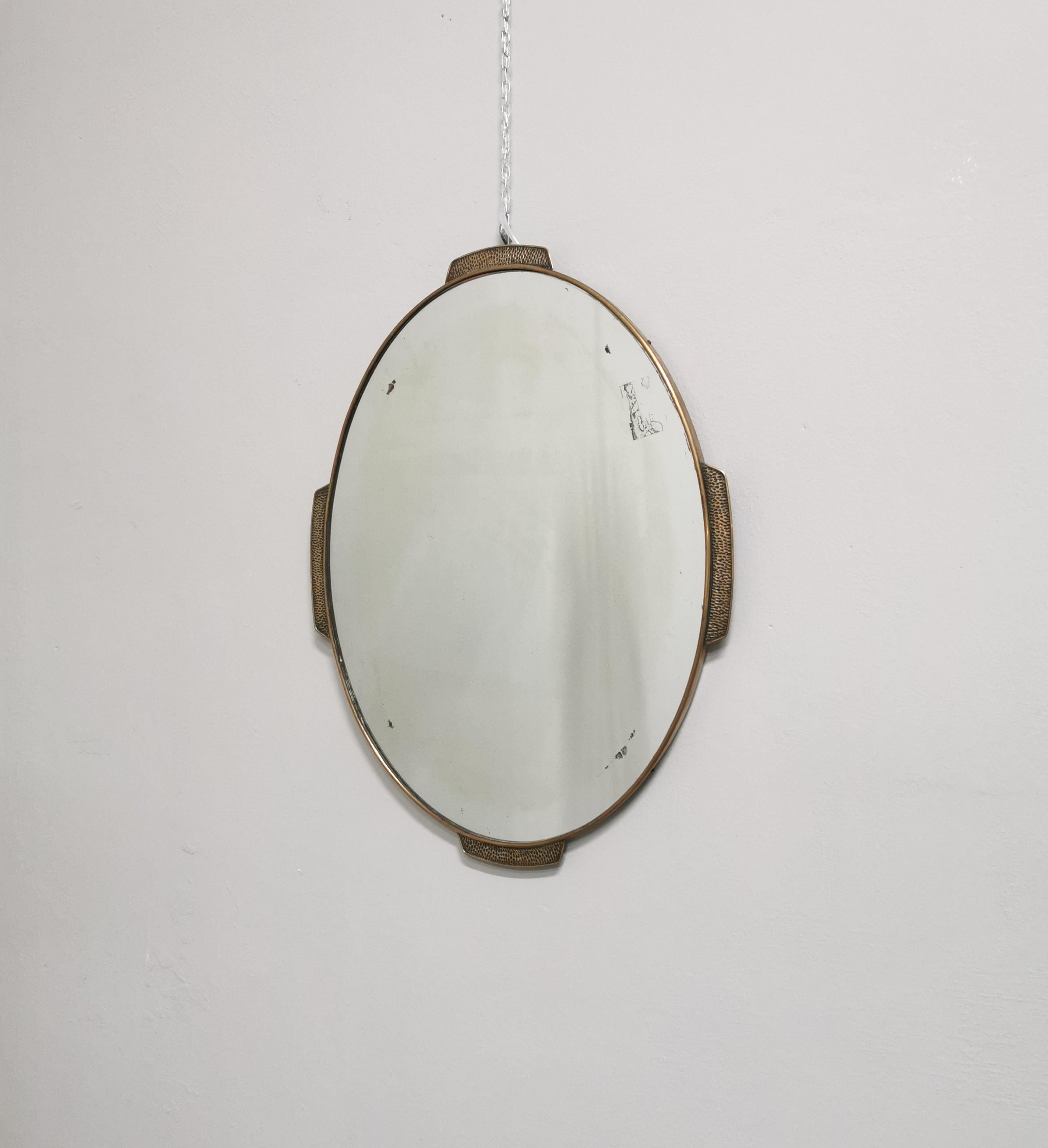 20th Century Mid Century Wall Mantel Mirror Brass Hammered Oval Italian Design 1950s