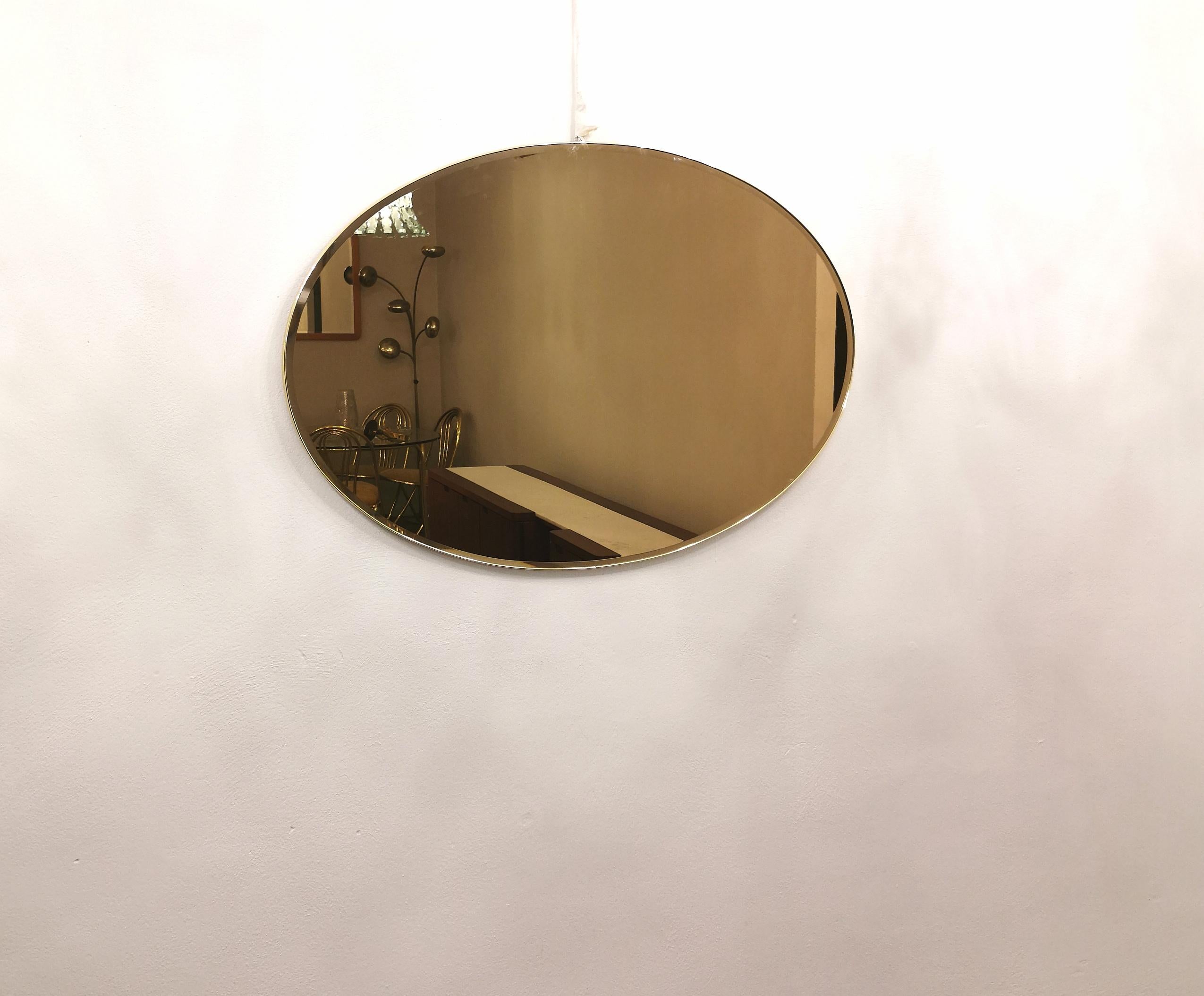 Wall Mirror Bronzed Glass Oval Brass Golden Midcentury Italian Design 1970s In Good Condition For Sale In Palermo, IT