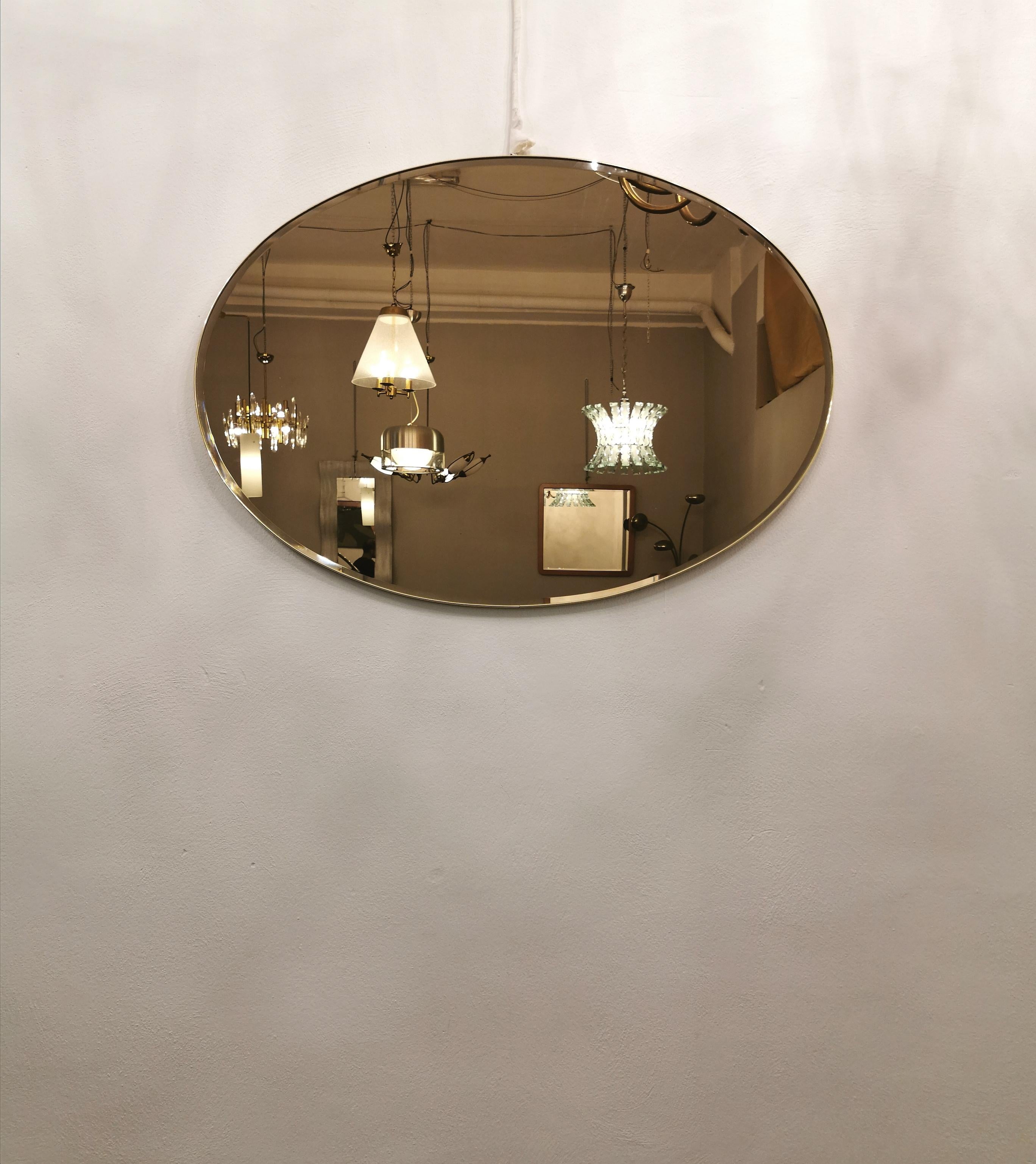 20th Century Wall Mirror Bronzed Glass Oval Brass Golden Midcentury Italian Design 1970s For Sale
