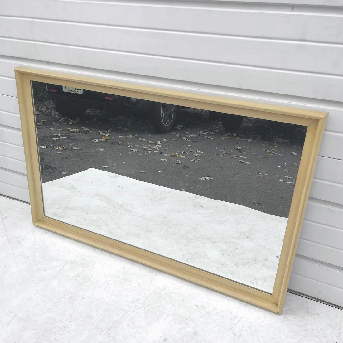 This subtle yet stylish mid-century modern mirror comes from a Paul Frankl for Johnson Brothers bedroom set and features a rounded corner wood frame and comes ready to hang. Matching king size headboard also available- see photos for more