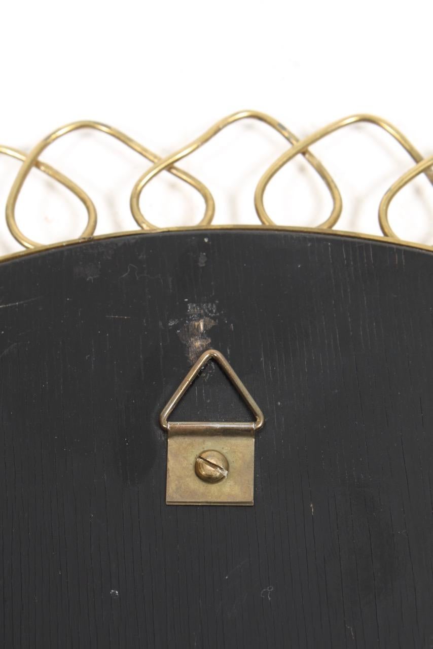 Mid-20th Century Midcentury Wall Mirror in Brass Made in Sweden, 1950s For Sale