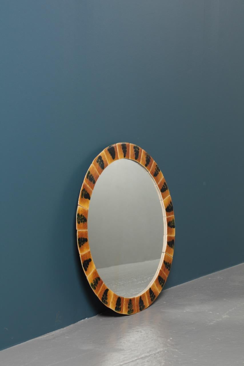 Art ceramic framed mirror by Danish artist Mogens Lund, sold by Illums Bolighus, 1960s. Great original condition.