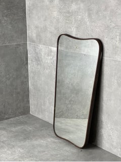 Mid-Century wall mirror with brass frame
