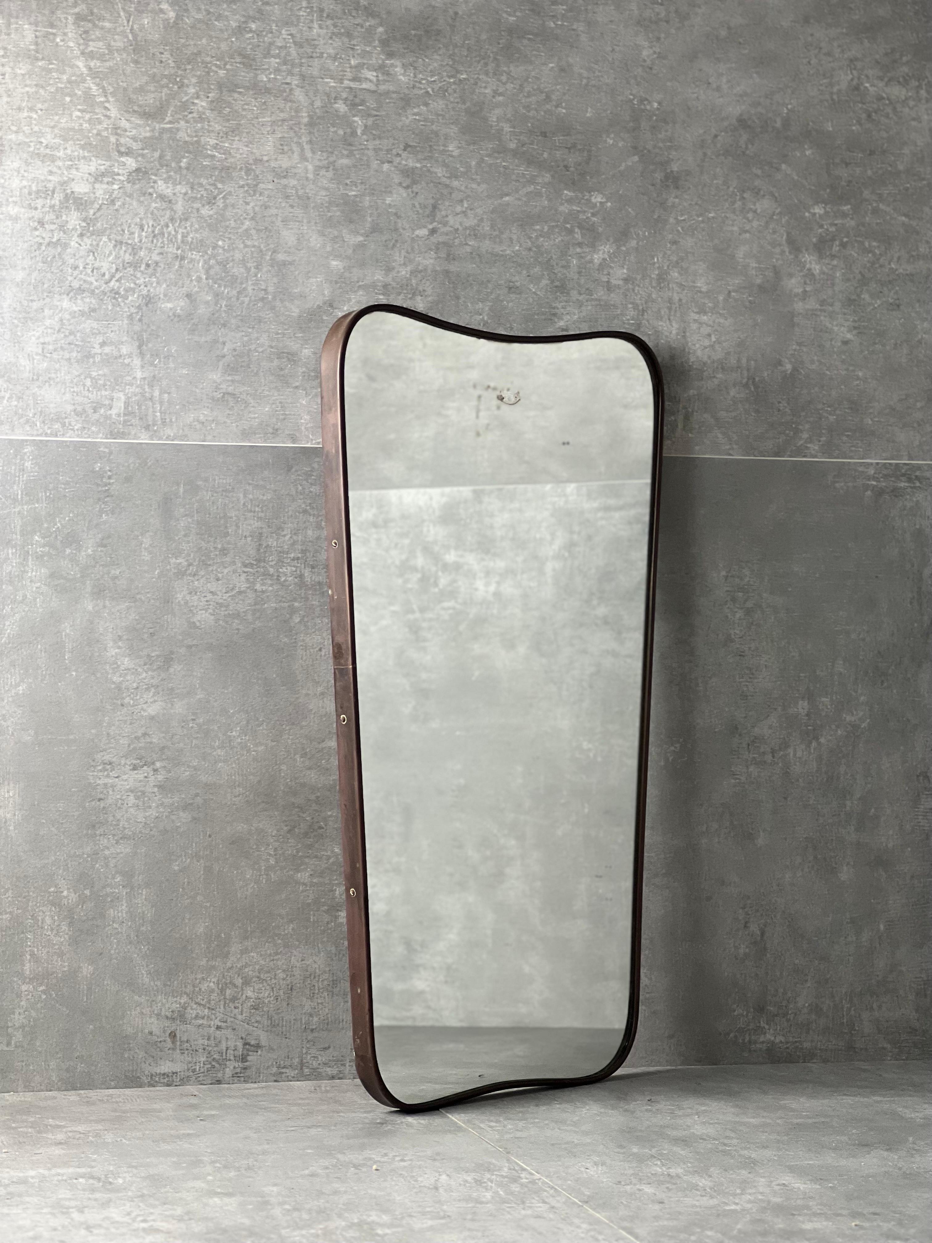 Mid-20th Century Mid-Century wall mirror with brass frame