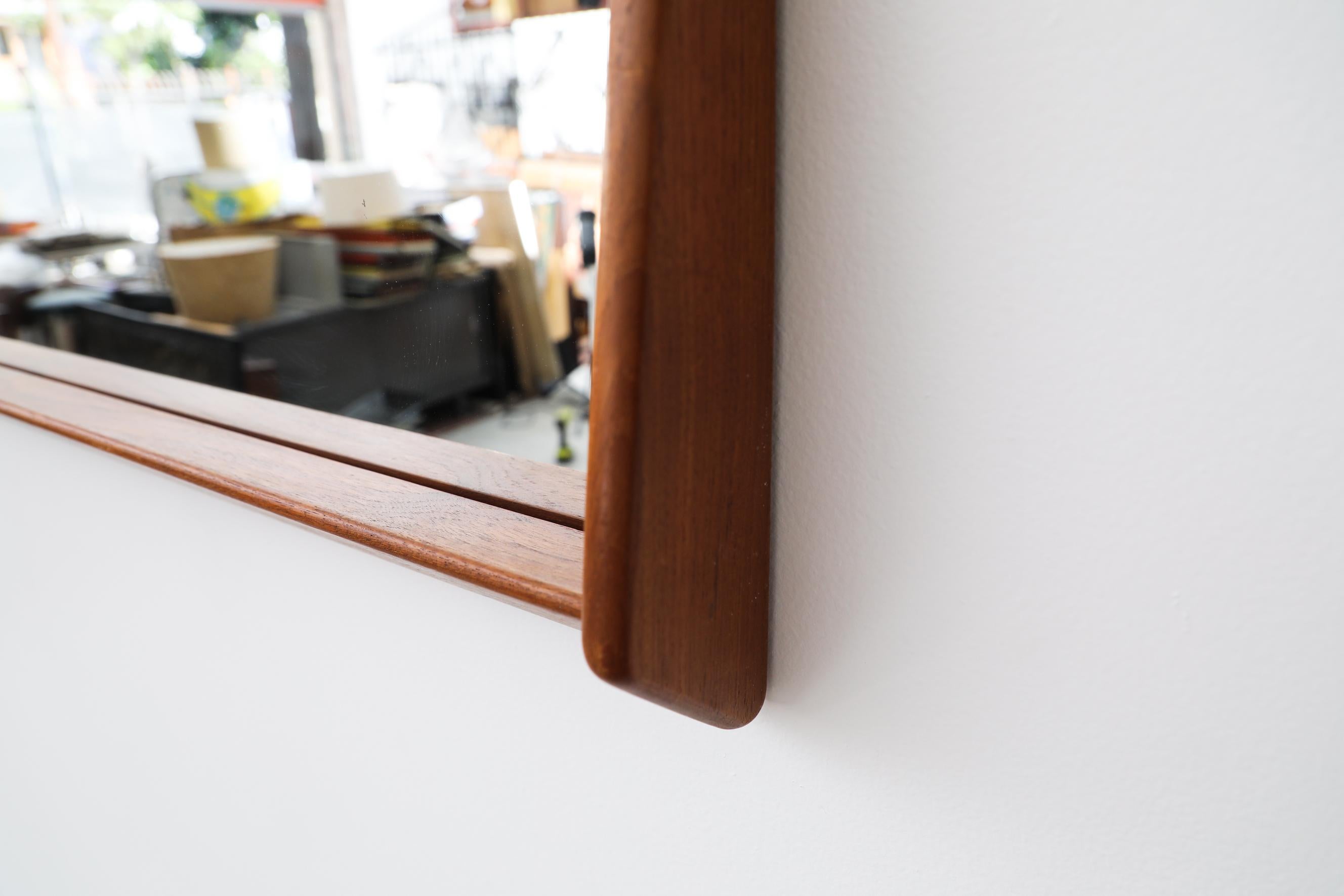 Mid-Century Wall Mounted Mirror w/ Rounded Triangular Teak Frame & Lower Lip For Sale 5