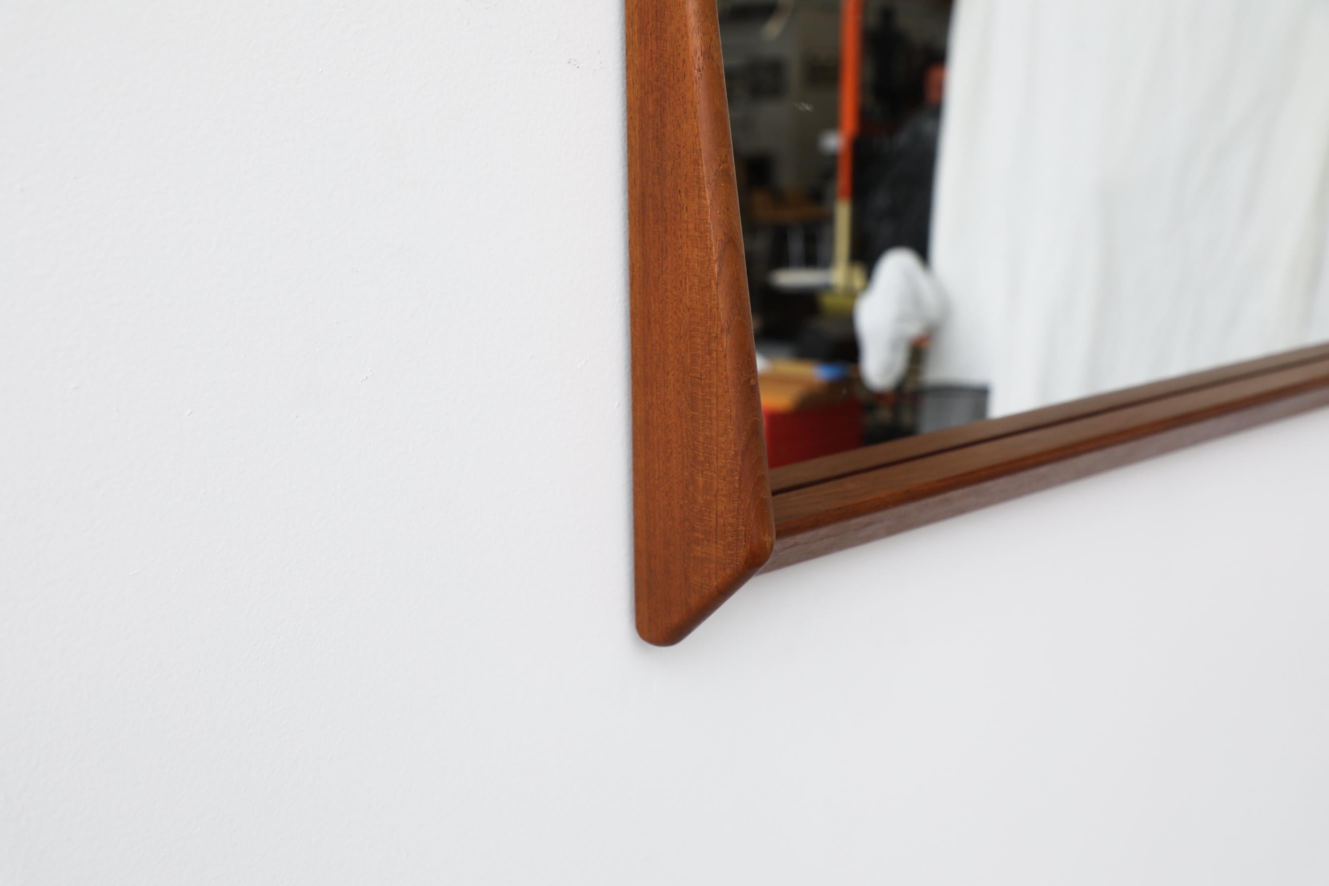 Mid-Century Wall Mounted Mirror w/ Rounded Triangular Teak Frame & Lower Lip In Good Condition For Sale In Los Angeles, CA
