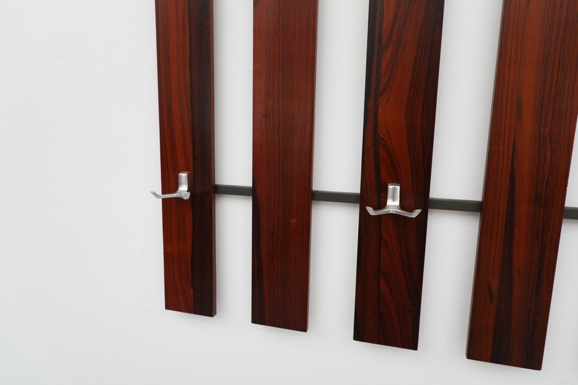 Mid-Century Wall Mounted Rosewood Coat Rack In Good Condition For Sale In Los Angeles, CA