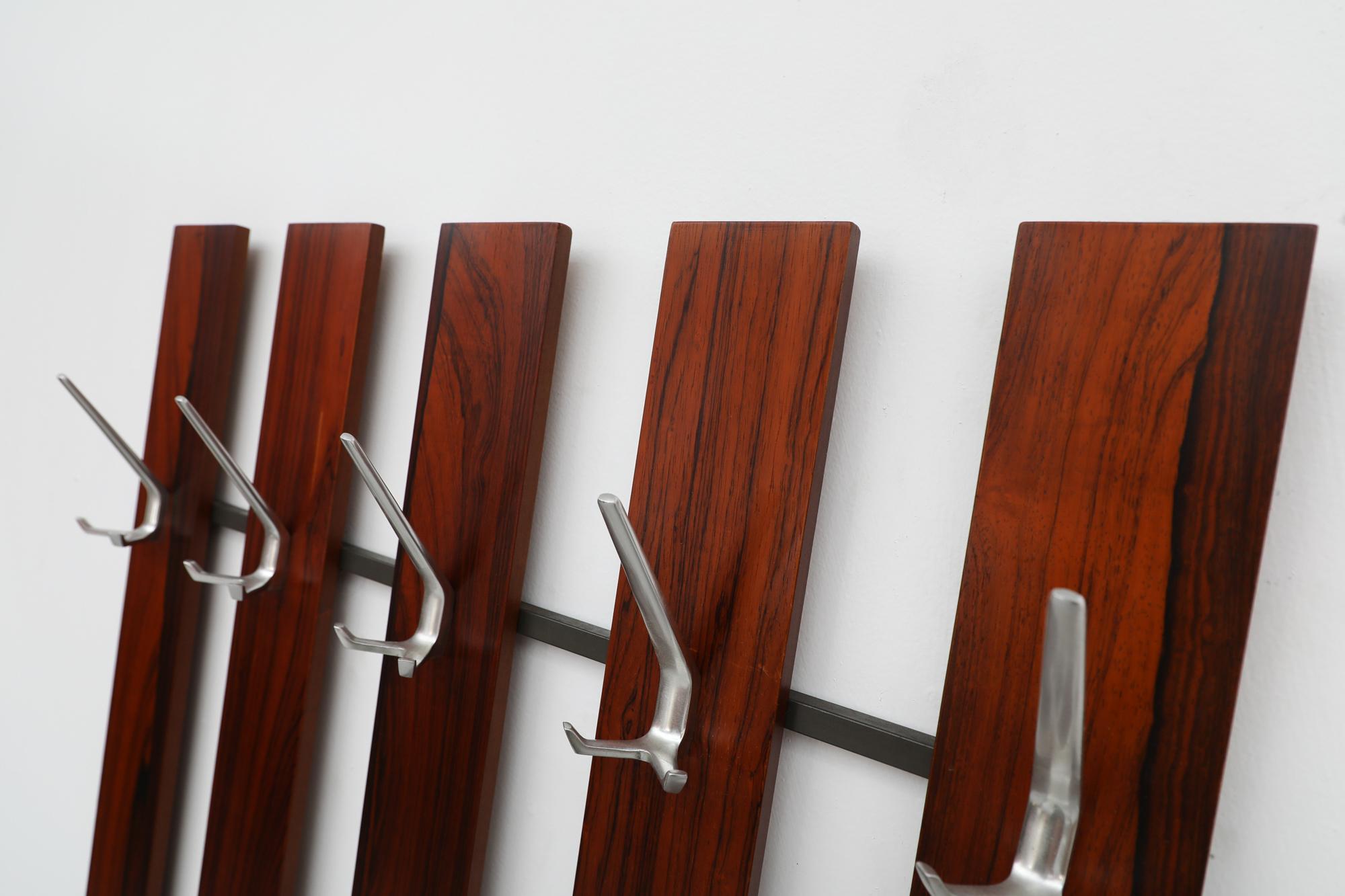 Mid-Century Rosewood Wall Mounted Coat Rack with Long Striped Woodgrain Pattern In Good Condition For Sale In Los Angeles, CA