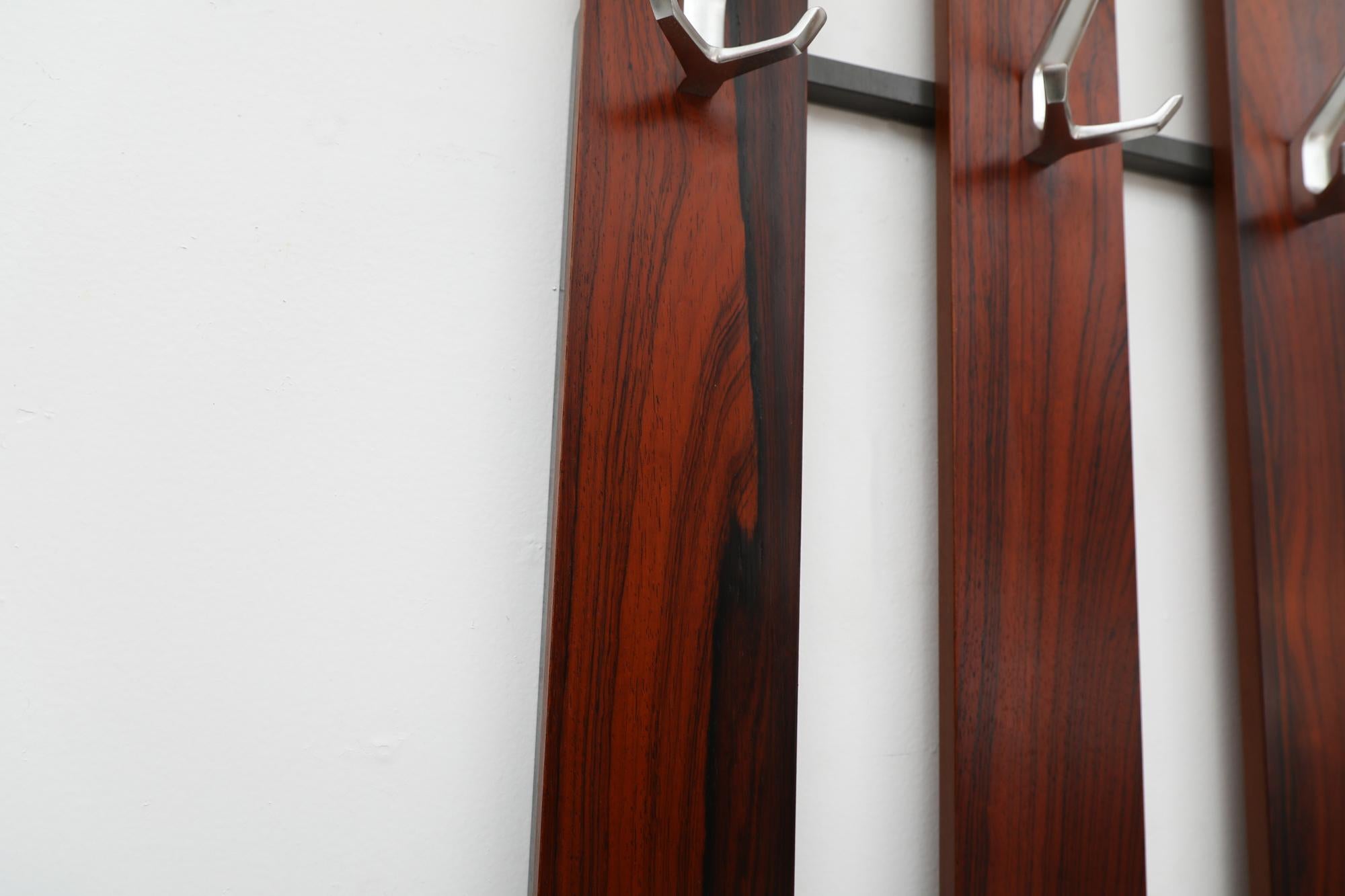 Mid-20th Century Mid-Century Rosewood Wall Mounted Coat Rack with Long Striped Woodgrain Pattern For Sale