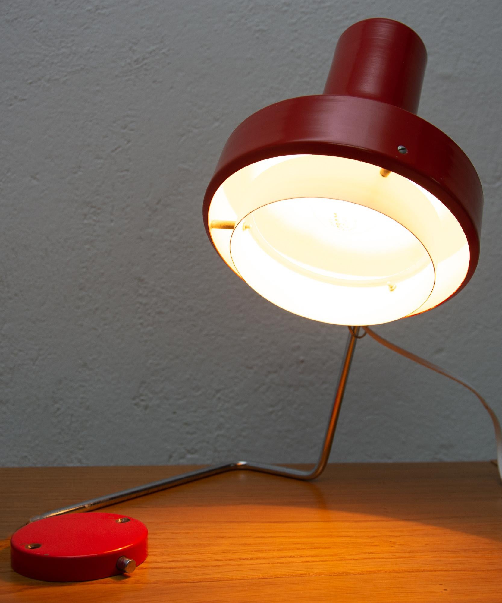This wall or table lamp was designed by Josef Hurka in the 1960s. Shade is made of aluminium, rest is made of painted and chromed steel. Lamp uses one E27, max 100W bulb.
