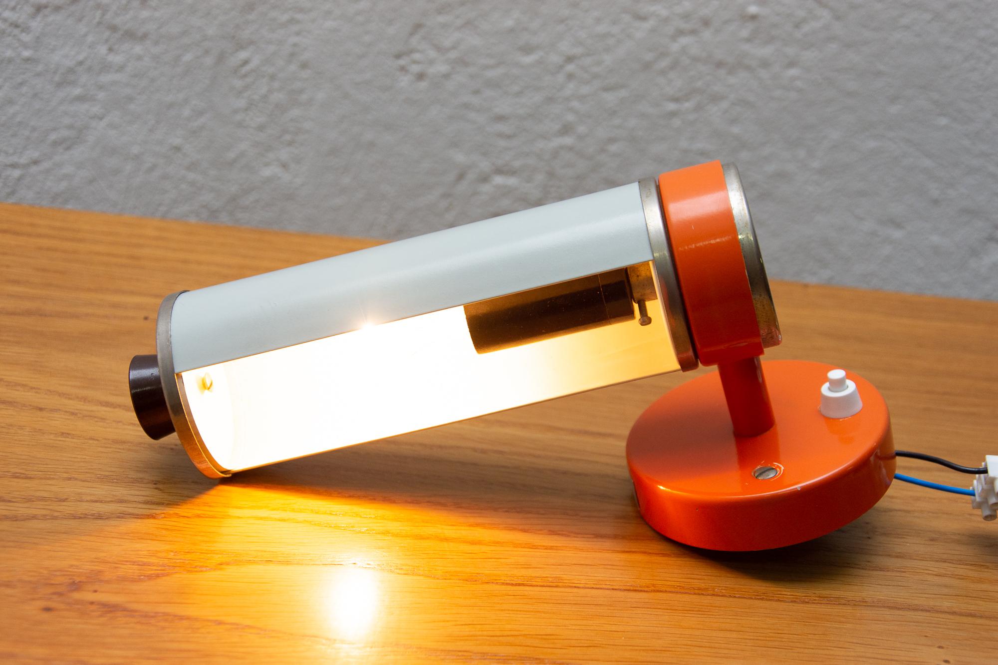 This wall lamp was designed by Josef Hurka in the 1960s. Material: plastic, aluminum, chrome. Lamp uses one E14 bulb.

In very good condition. New wiring.
