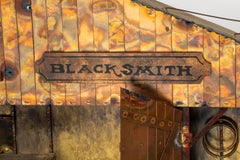 Wall Sculpture “Blacksmith Shop” by Curtis Jere