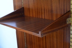 Système d'étagères murales du milieu du siècle par André Monpoix