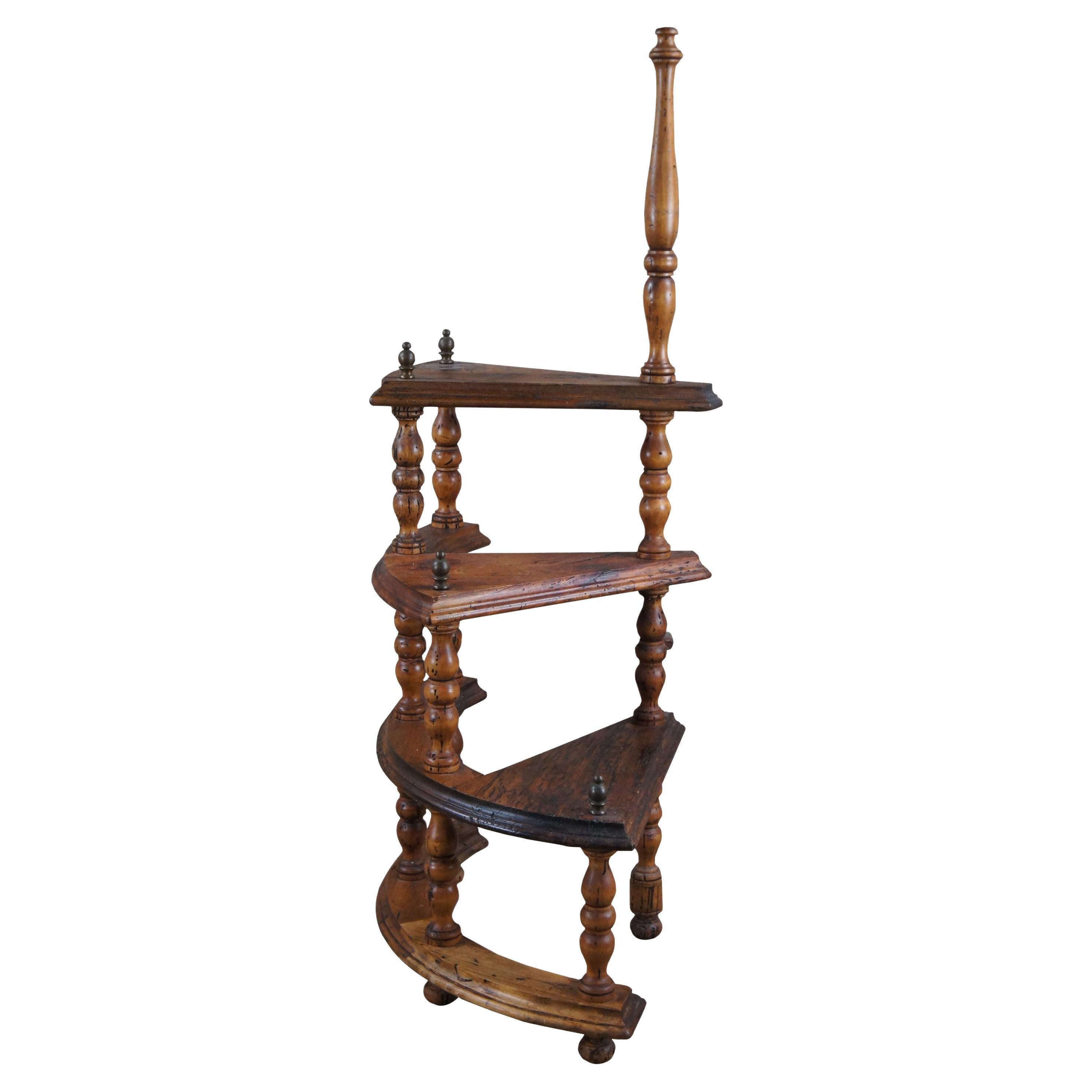 Antique spiral library book staircase or step ladder. Made of walnut featuring three tiers with turned posts and brass finials. Measure: 44