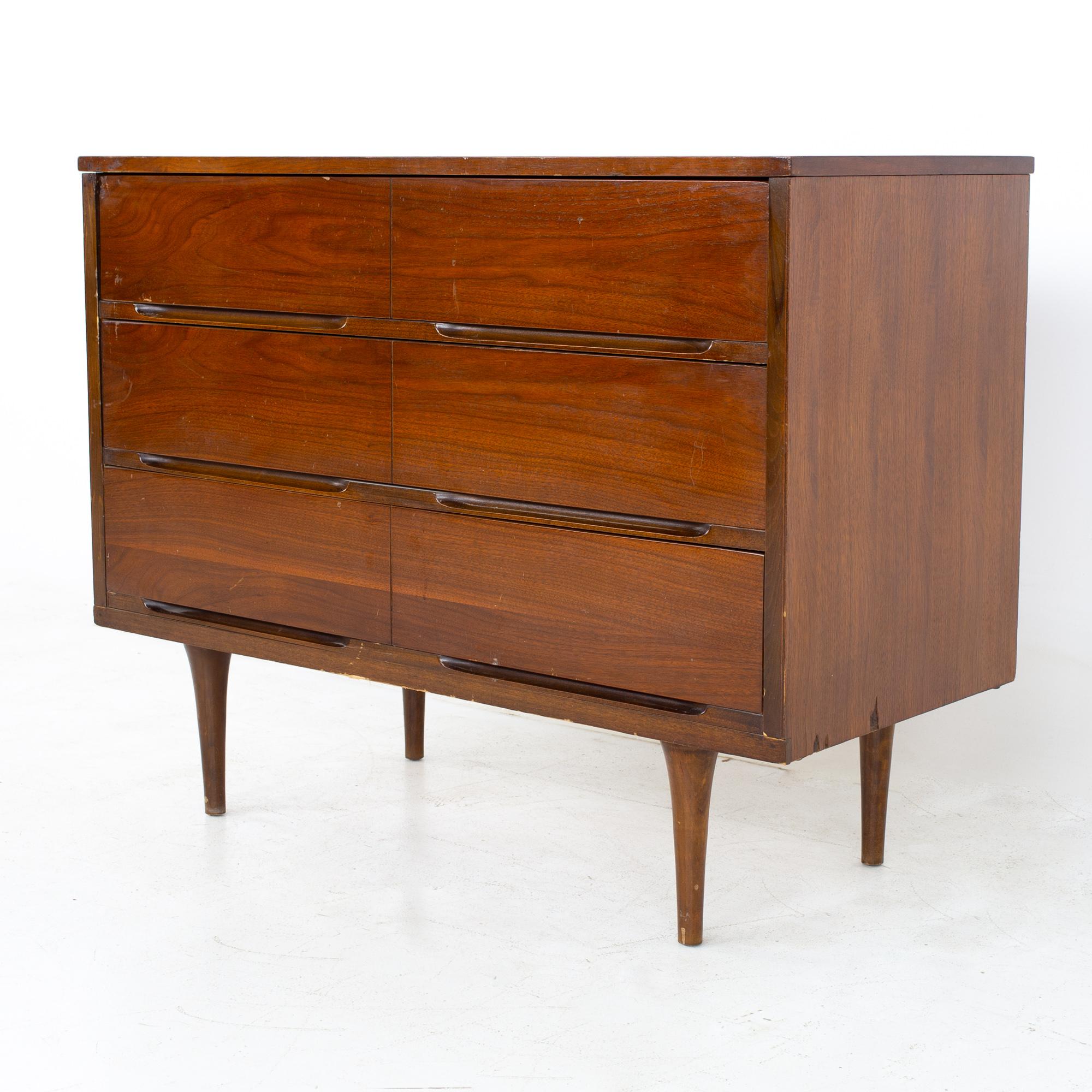 Mid century walnut 6 drawer lowboy dresser
Dresser measures: 40.25 wide x 17.75 deep x 31 inches high

All pieces of furniture can be had in what we call restored vintage condition. That means the piece is restored upon purchase so it’s free of