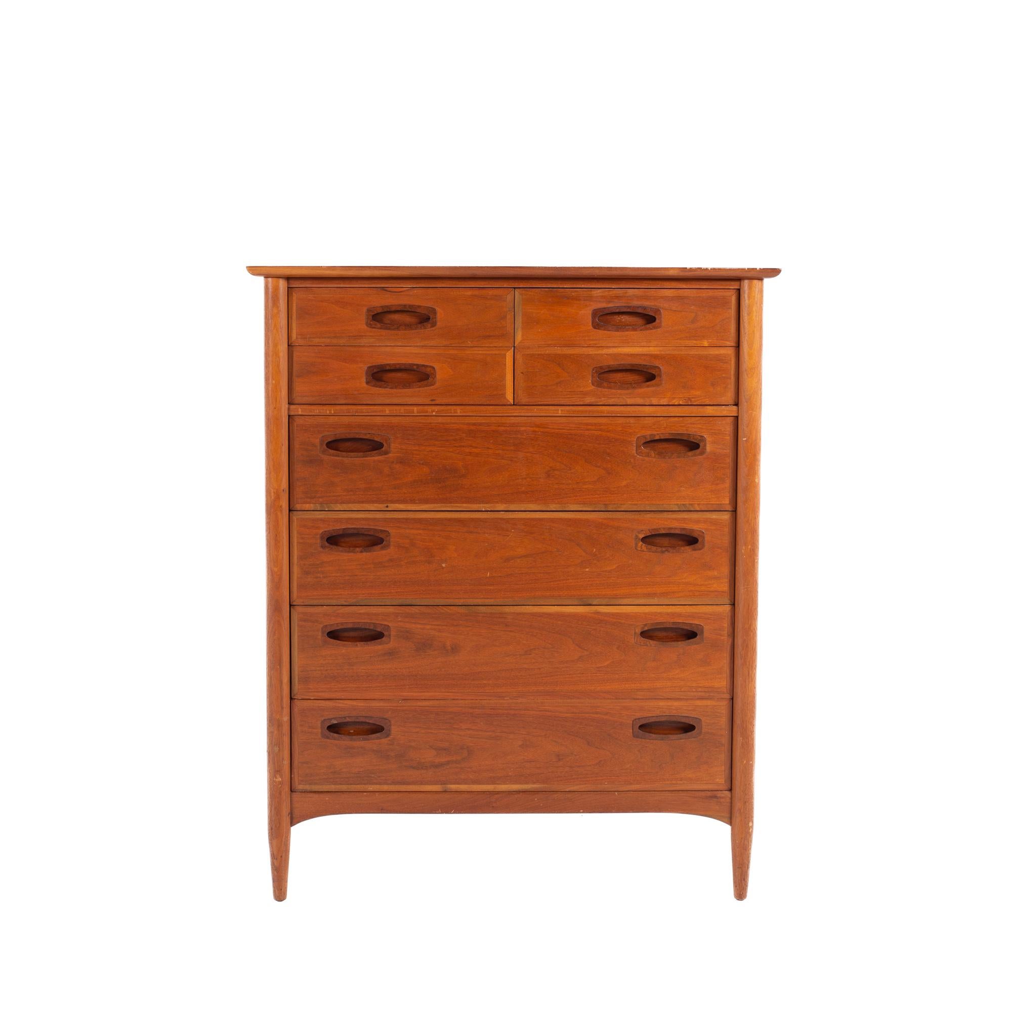 Mid-century walnut 8 drawer highboy dresser

The dresser measures: 38 wide x 20 deep x 47 inches high

All pieces of furniture can be had in what we call restored vintage condition. That means the piece is restored upon purchase so it’s free of