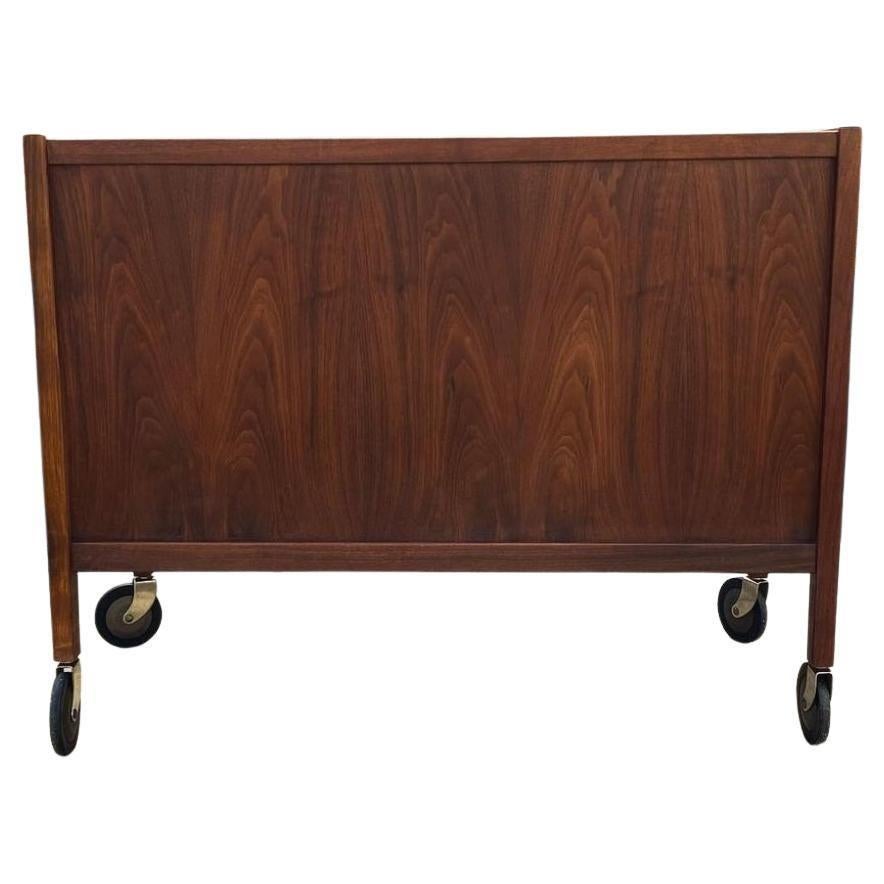 Mid-Century Modern Mid century walnut and cane bar cart on casters by Jack Cartwright Founders For Sale