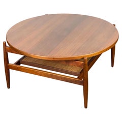 Mid Century Walnut and Cane Floating Round Cocktail Table by Jens Risom
