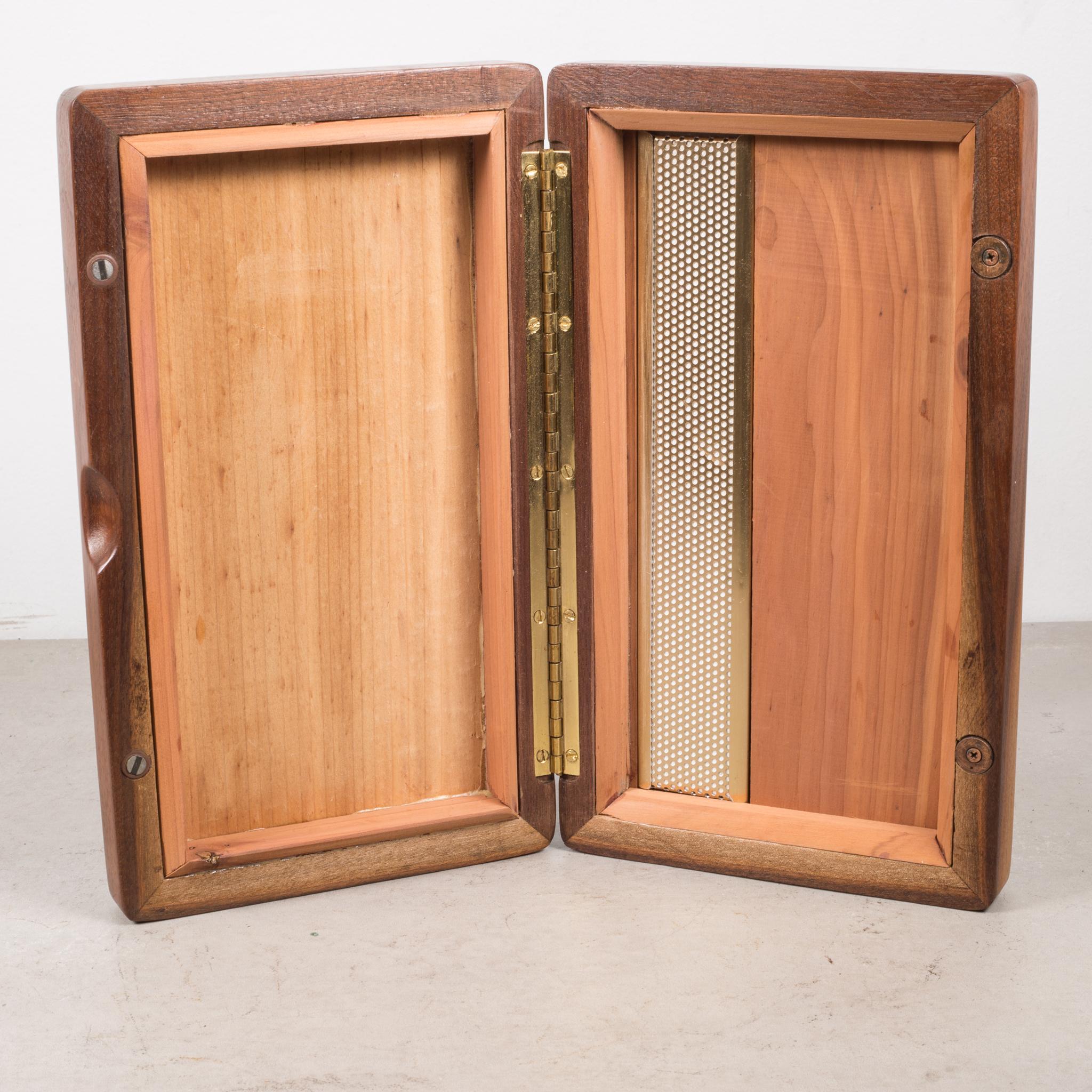 About

A solid, well made midcentury walnut humidor lined with cedar and brass accents. Pleasant cedar scent inside.

 Creator: Unknown.
 Date of manufacture: circa 1960s-1970s.
 Materials and techniques: Walnut, cedar, brass.
 Condition: