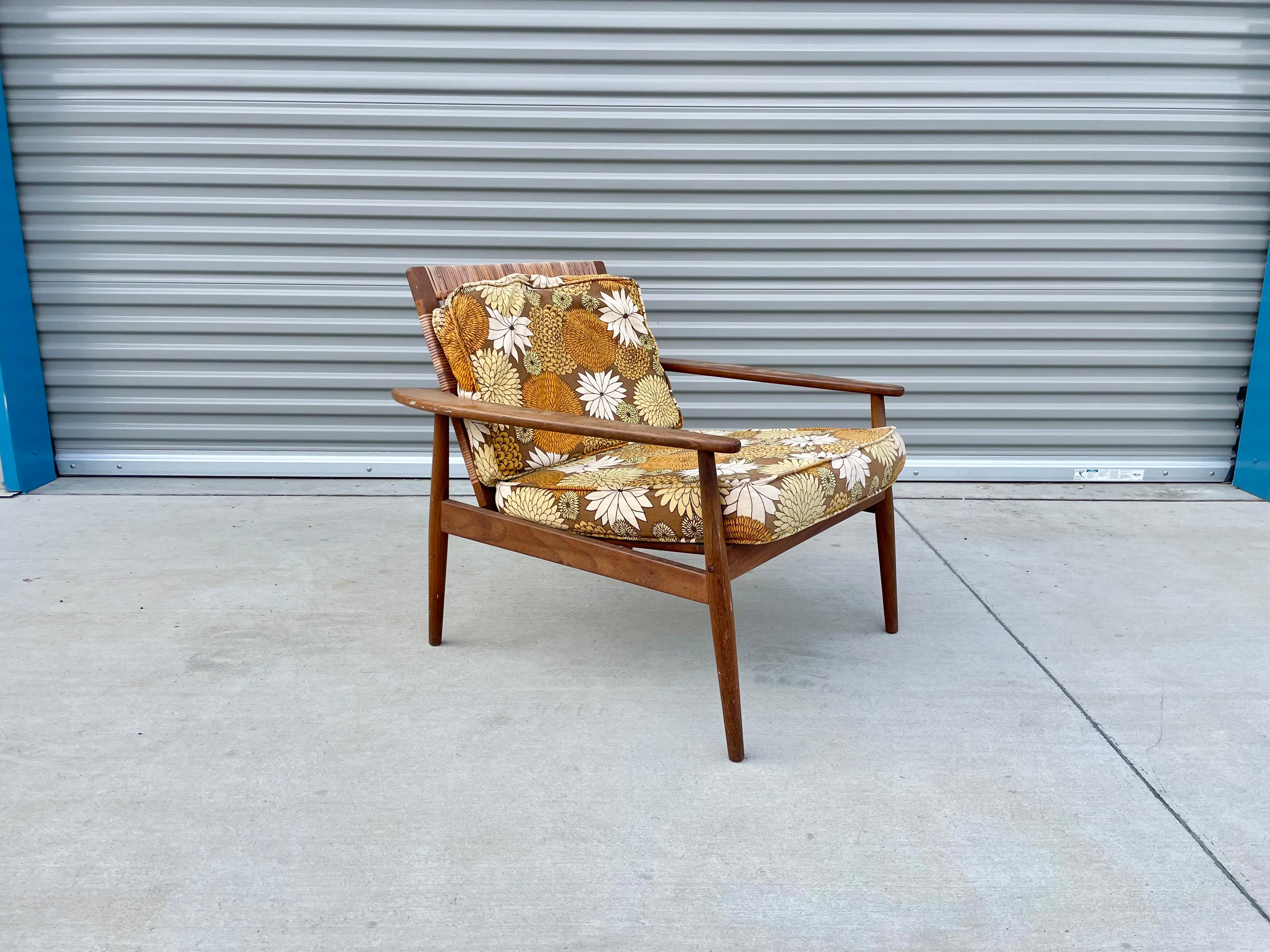 Mid-Century Modern Midcentury Walnut Cane Lounge Chair Styled After Hans Olsen For Sale