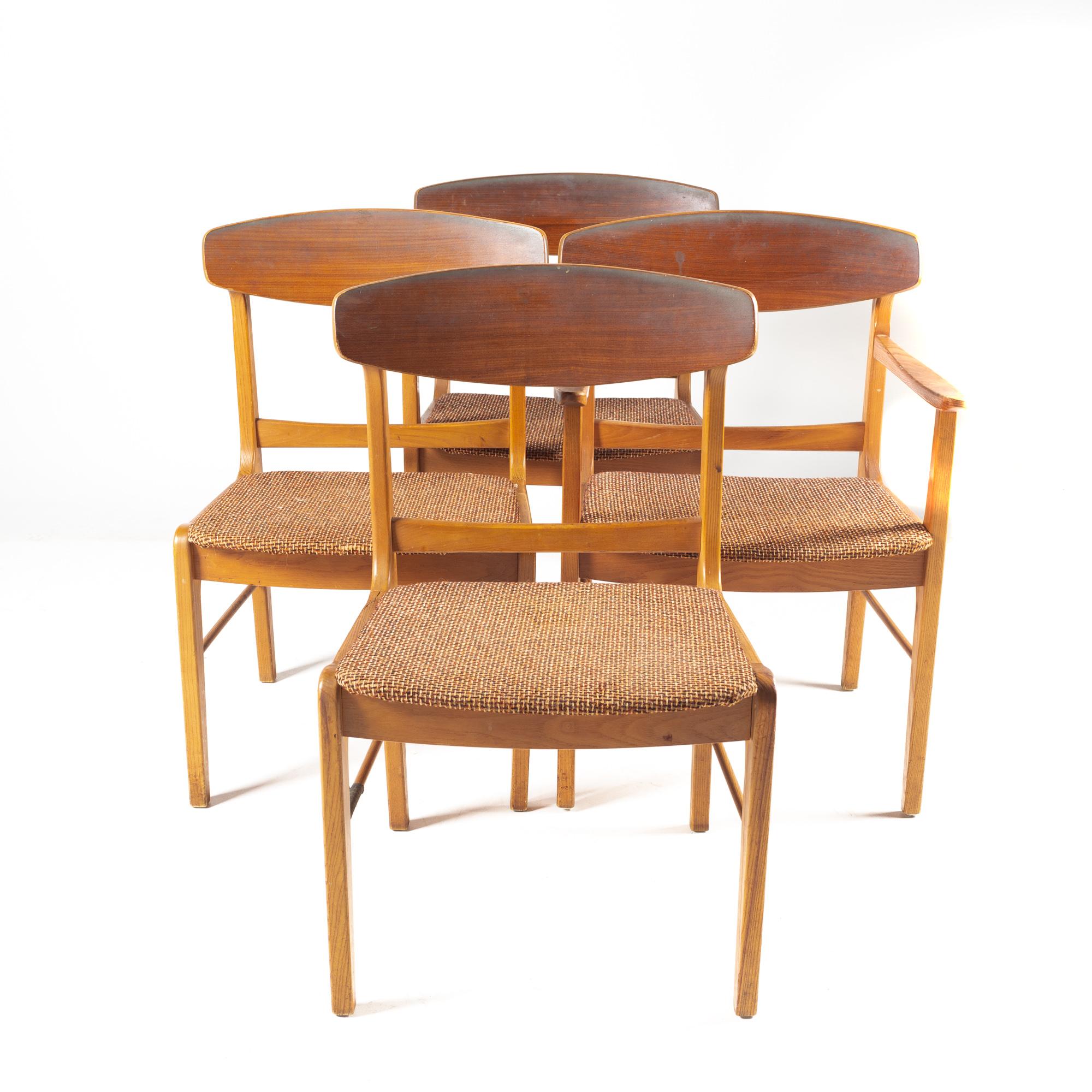 Mid Century Walnut cats eye dining chairs - Set Of 4

Each chair measures: 22 wide x 21 deep x 32 inches high, with a seat height of 16 and arm height of 24 inches

All pieces of furniture can be had in what we call restored vintage condition.