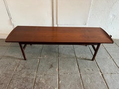 Mid century walnut coffee table by Jack Cartwright for Founders