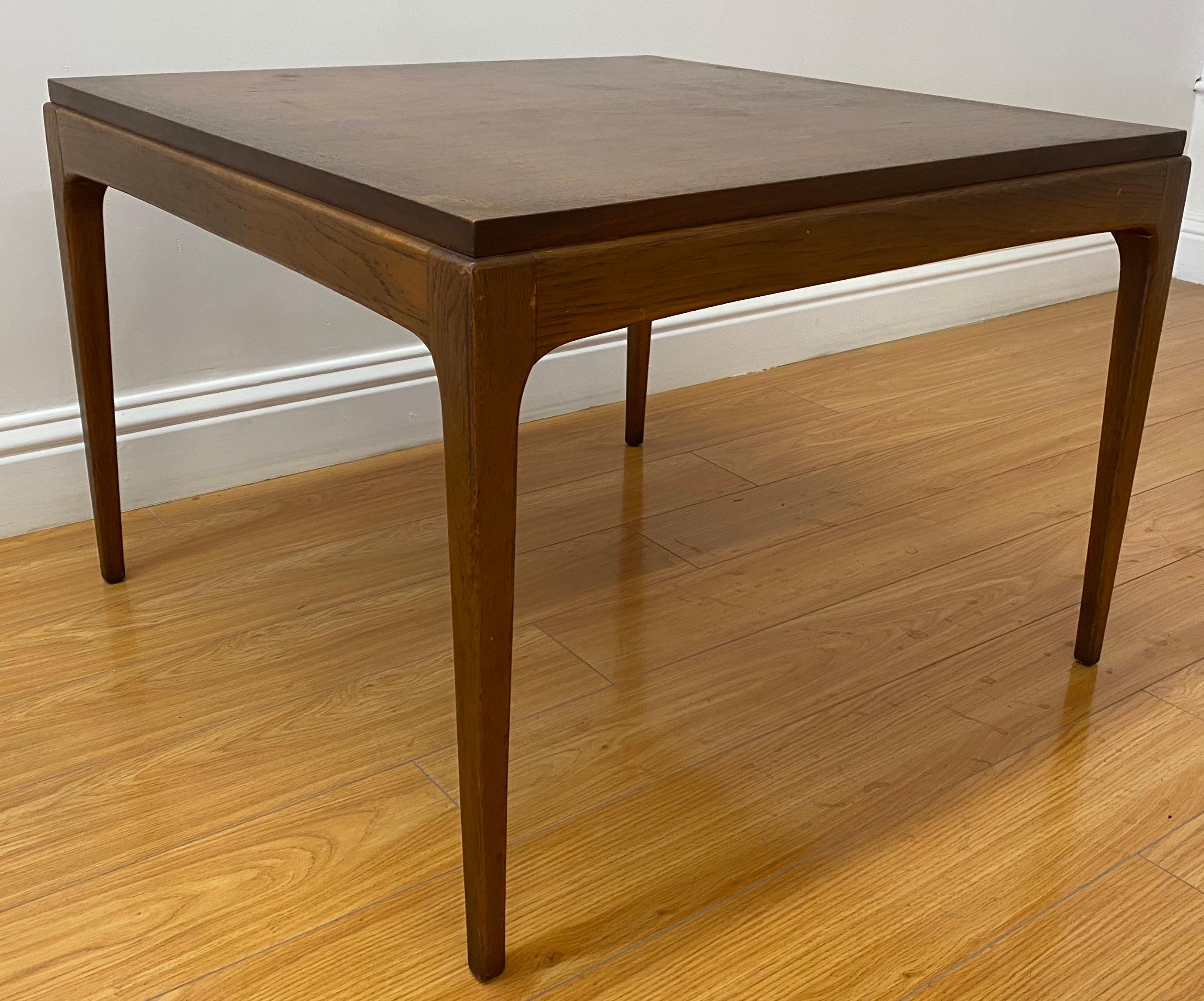 Mid century walnut coffee table by Lane, Altavista, Virginia

Measures: 28.5