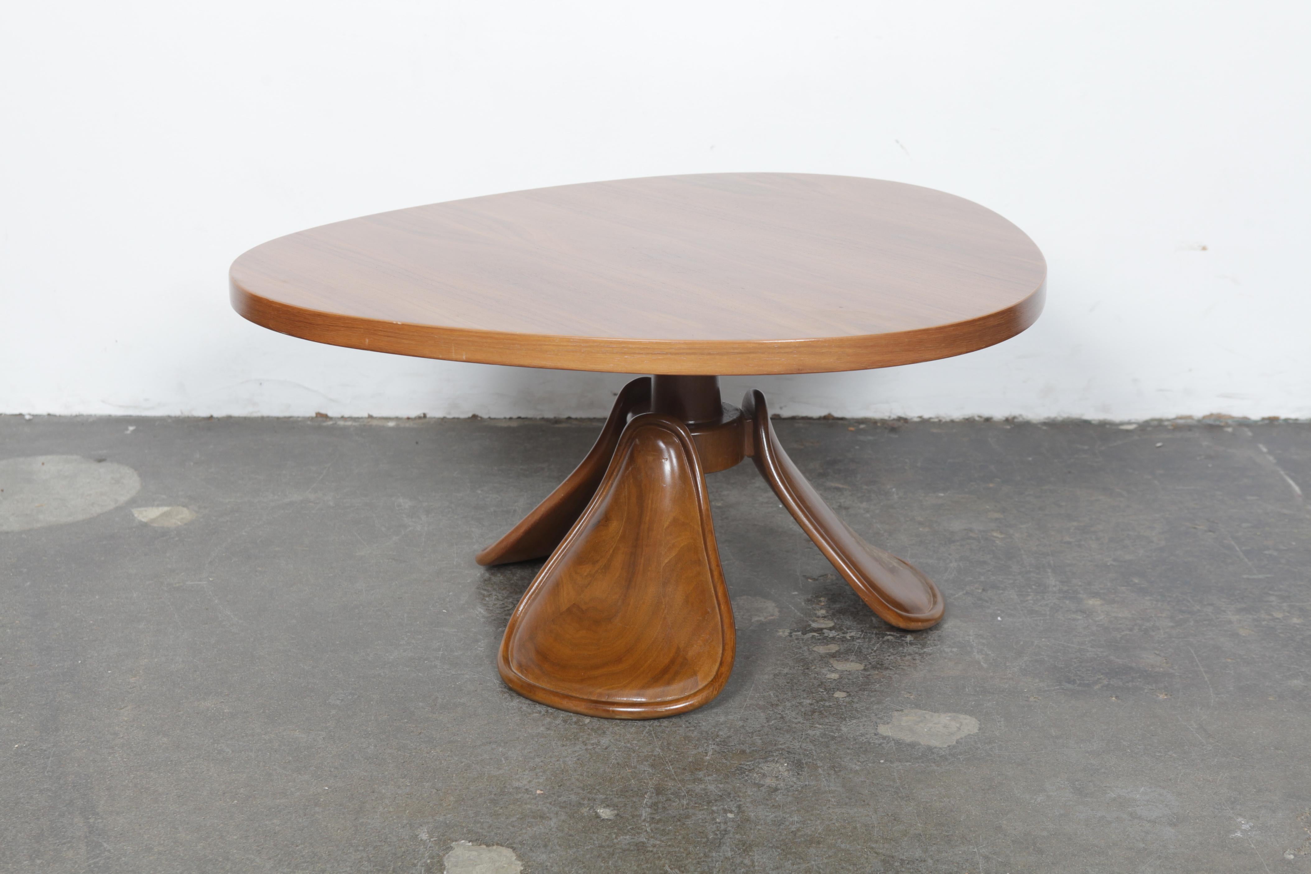 Very unique 3 legged coffee table with organic shaped top, in Walnut, USA, 1960s.