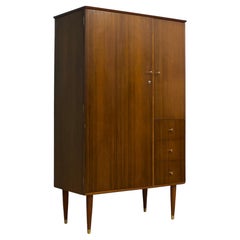 Armadio compatto in noce di metà secolo di Uniflex, anni '60