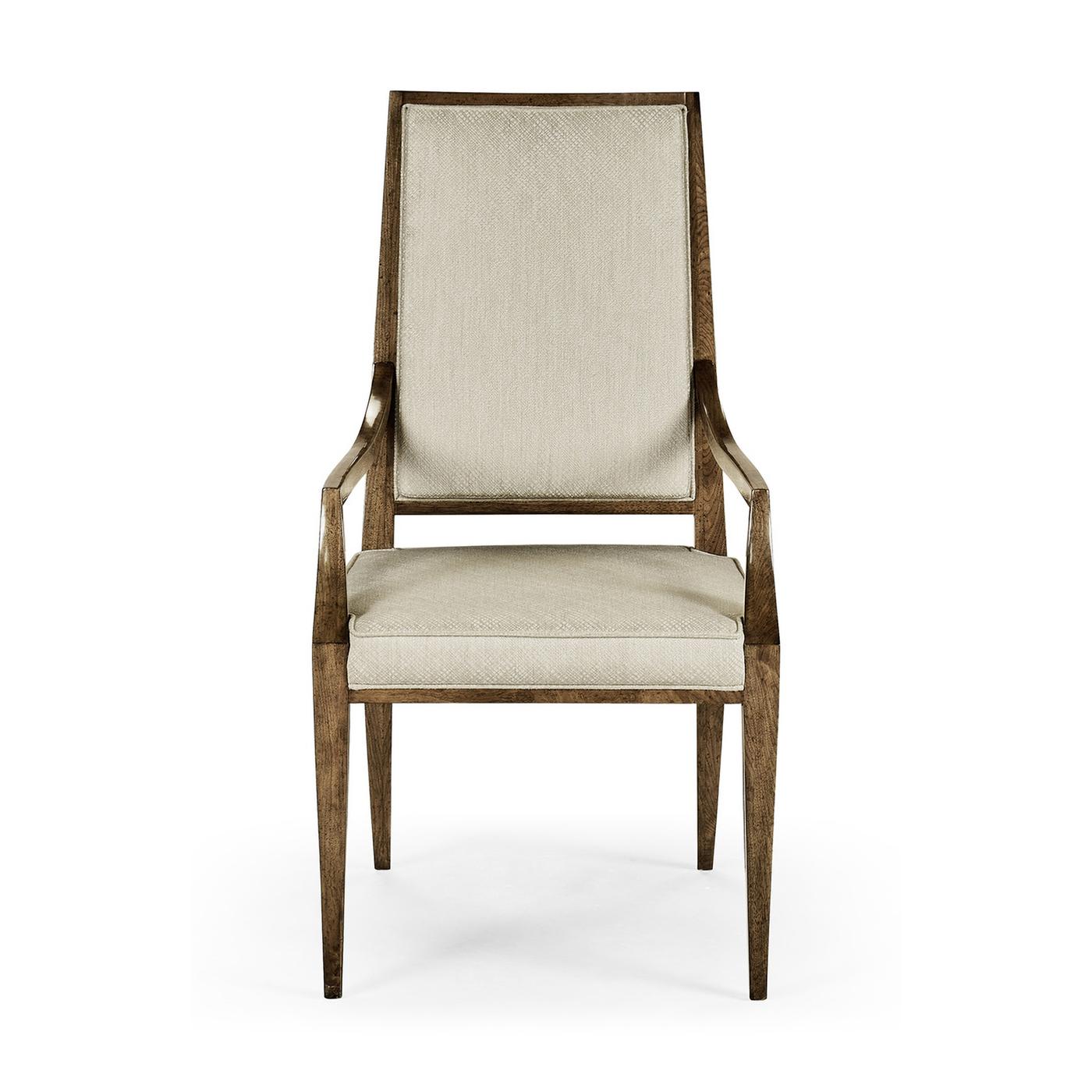 Mid century walnut dining armchair, sculpted from American walnut, with a transparent, hand-rubbed finish. This chair has elegant simple lines and is upholstered in a performance fabric. 

Dimensions: 23