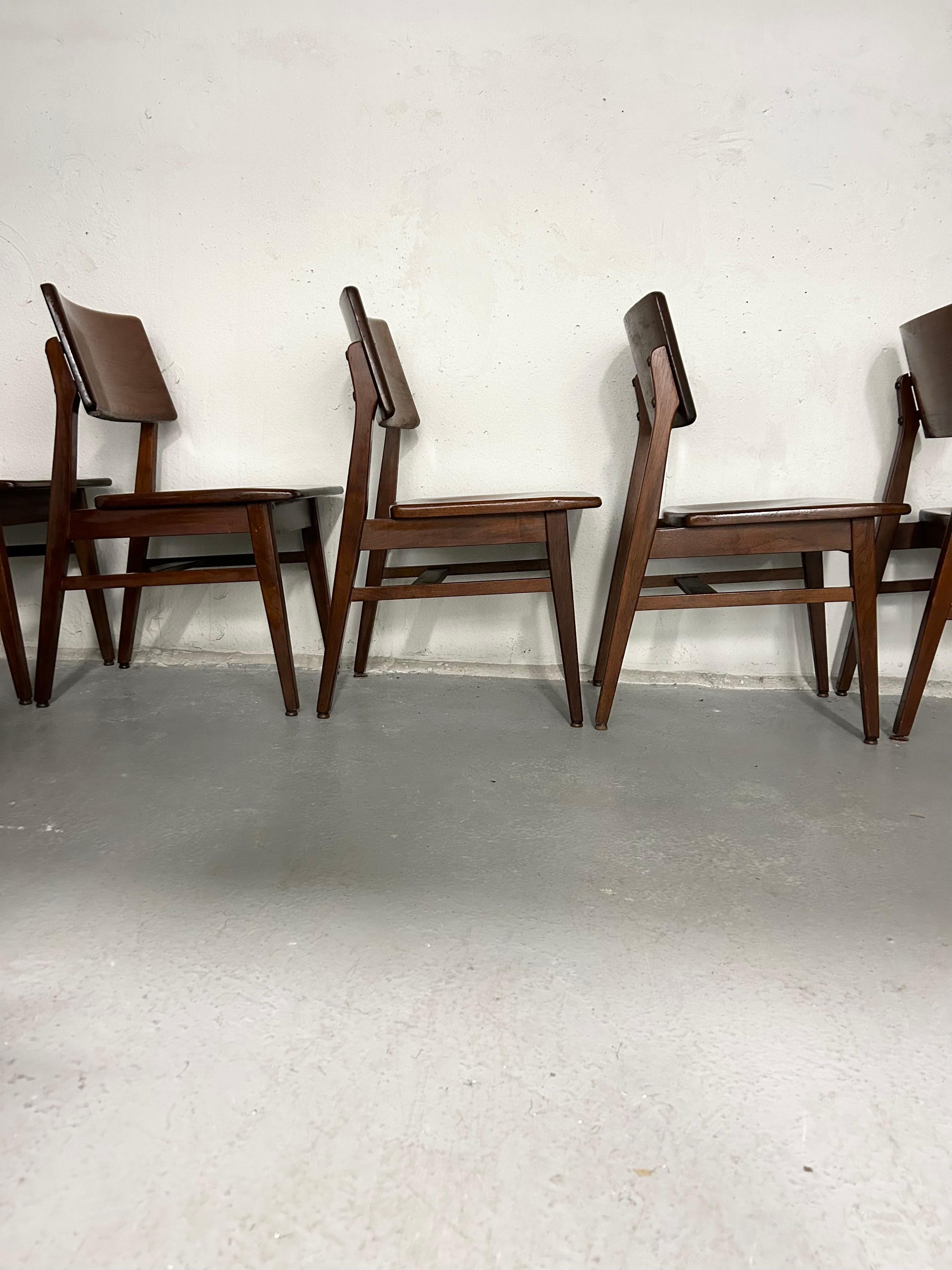 Vintage Mid-Century Modern walnut dining chairs by B.L. Marble Furniture. In very good condition. Normal wear for age - some marks throughout but nothing major. Selling individually. 