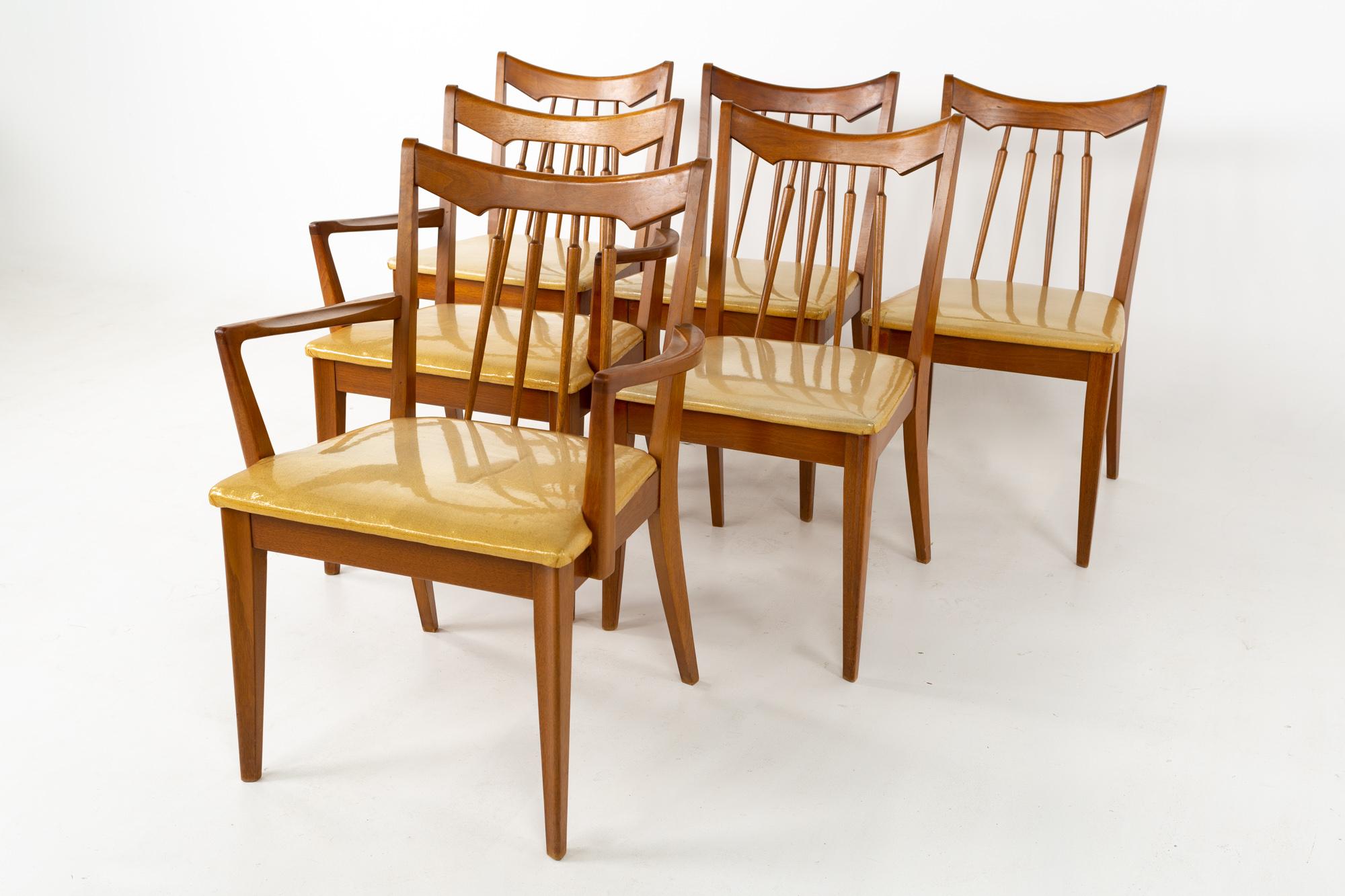 Mid century walnut dining chairs - set of 6
These chairs are 24 wide x 22.25 deep x 33 inches high, with a seat height of 17.75 and arm height of 25.25 inches 

All pieces of furniture can be had in what we call restored vintage condition. That