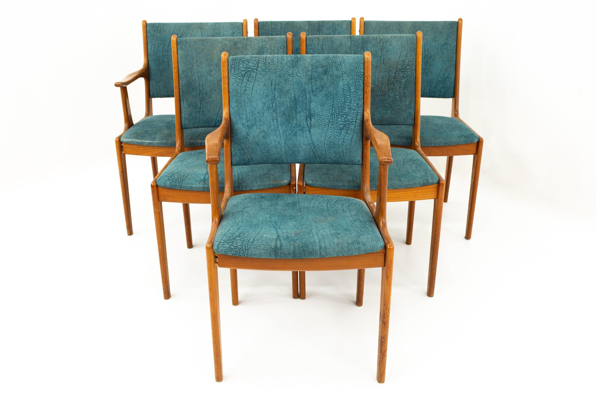 Mid Century teak dining chairs, set of 6

Each chair measures: 21.5 wide x 20 deep x 35 high with a seat height of 18 inches

This set is available in what we call restored vintage condition. Upon purchase it is thoroughly cleaned and minor repairs