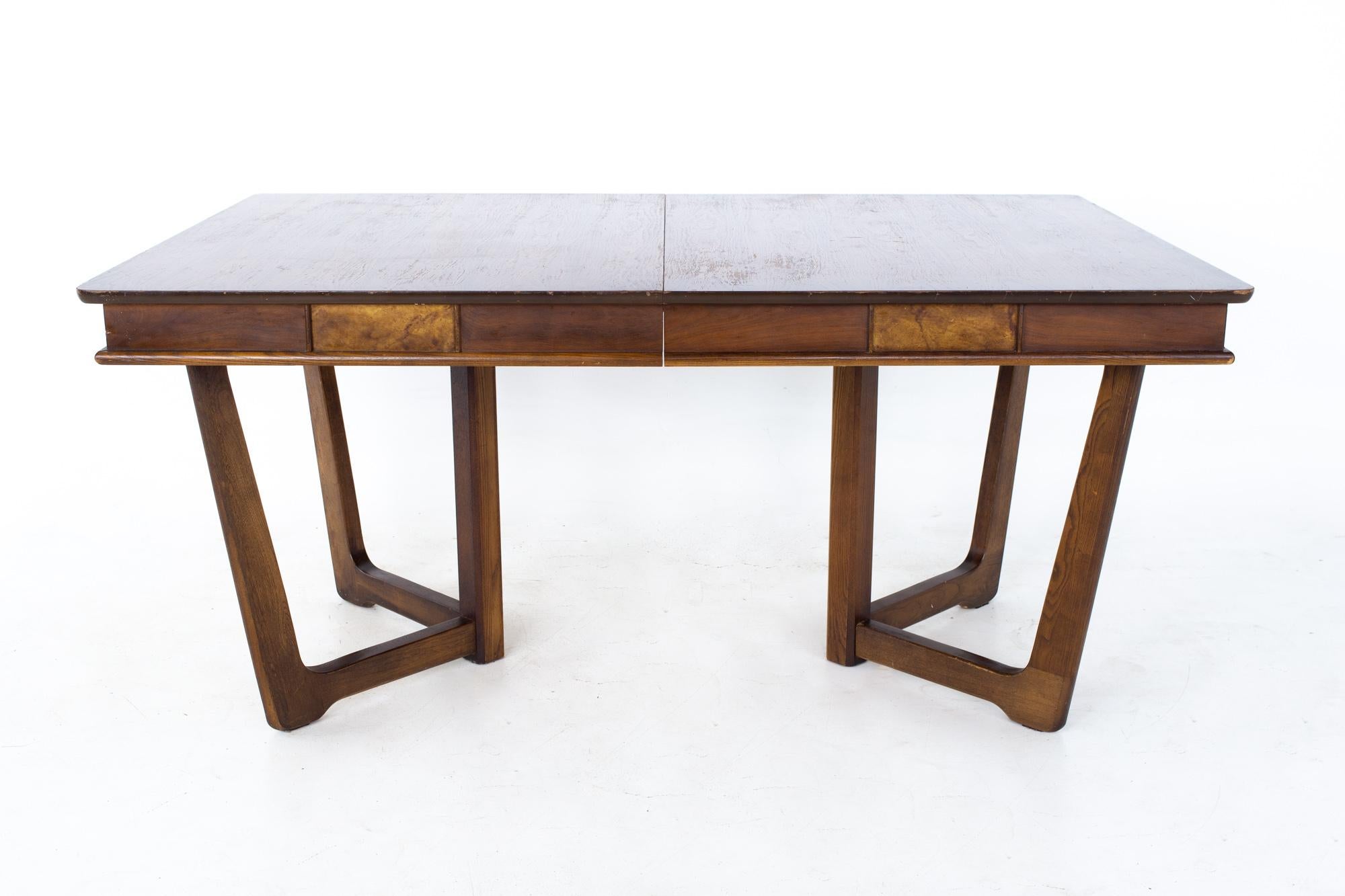 Mid century walnut dining table
Table measures: 42 wide x 64 deep x 30.5 inches high, with a chair clearance of 26 inches 

All pieces of furniture can be had in what we call restored vintage condition. That means the piece is restored upon