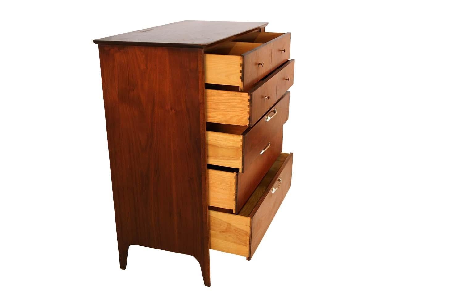 A gorgeous, walnut midcentury, tall, highboy dresser / chest by Drexel, in nearly pristine condition. Minimalist Danish modern inspired profile, with exceptional construction and style. Features five dovetailed drawers with brass pulls, and painted
