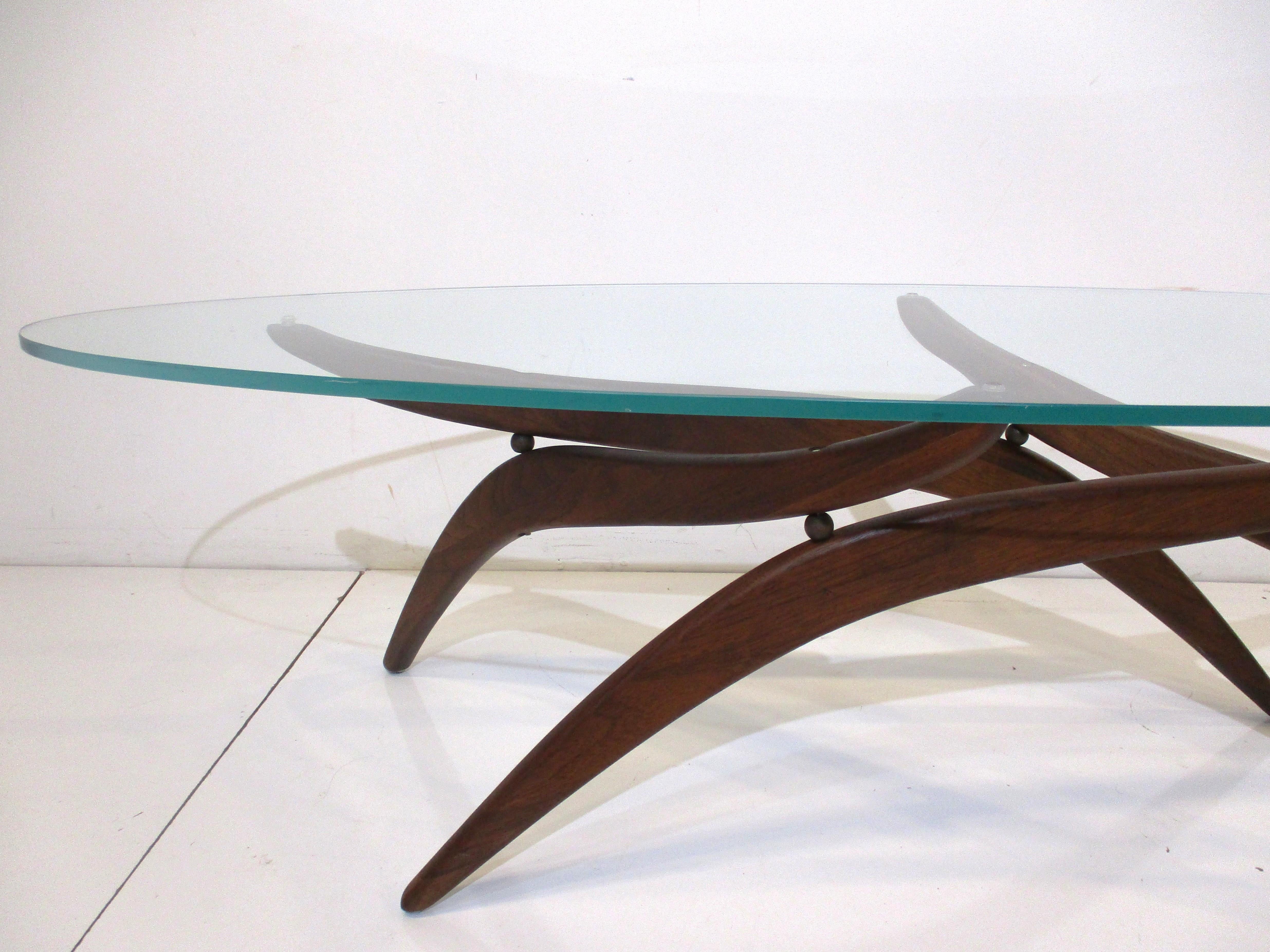 American Mid Century Walnut Glass Coffee Table by Forest Wilson in the style of Pearsall