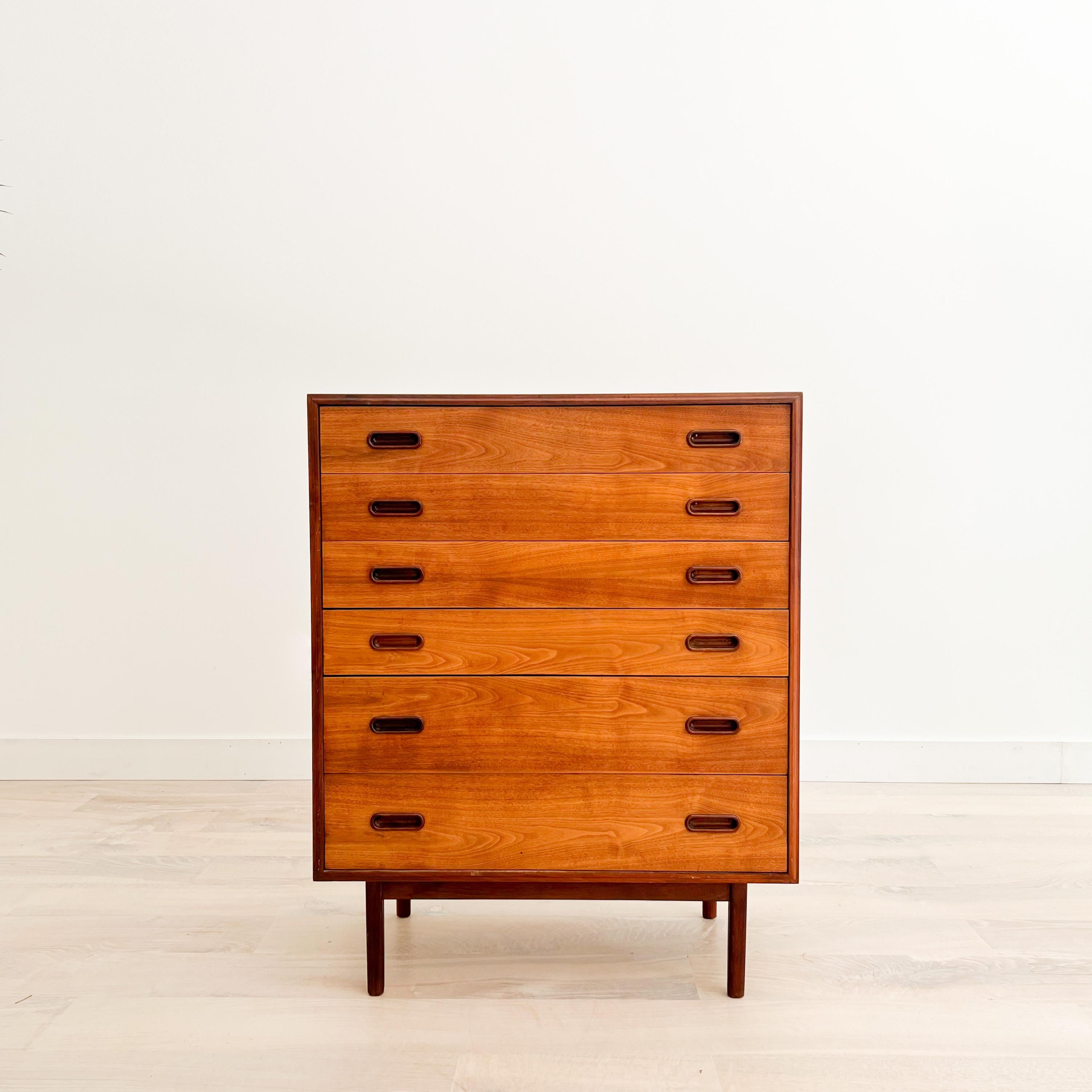 Rare Mid-Century Modern highboy dresser designed by Jack Cartwright for Founders. The top and drawer fronts have been sanded and restored. Some light scuffing, scratching and areas of veneer repair from age appropriate wear. This highboy dresser