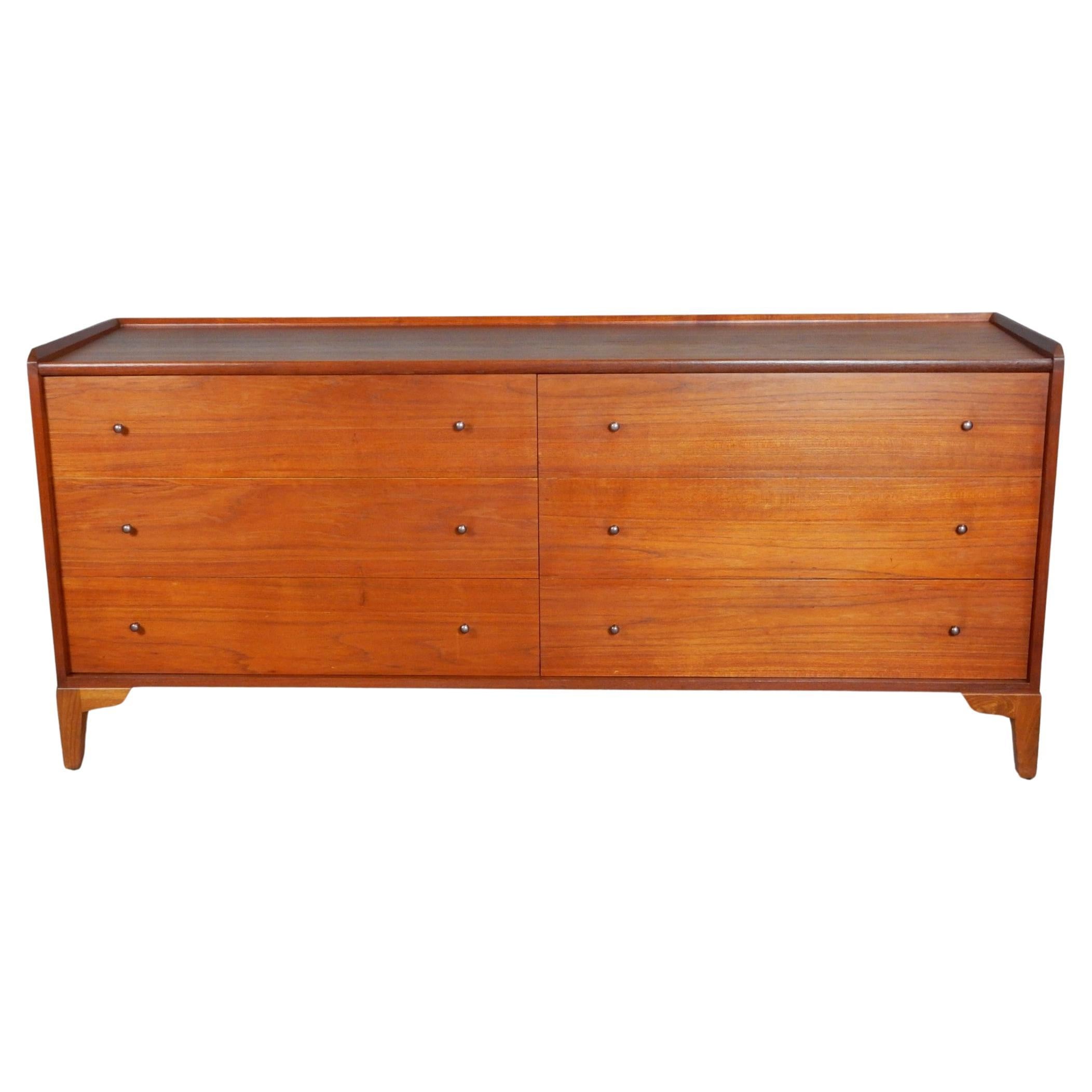 Gorgeous two-tone Walnut low chest of drawers designed by Charles Pechanec circa 1950's.
Charles Pechanec was a furniture designer and maker who worked in California during the mid-20th century. He is known for his modernist designs that often