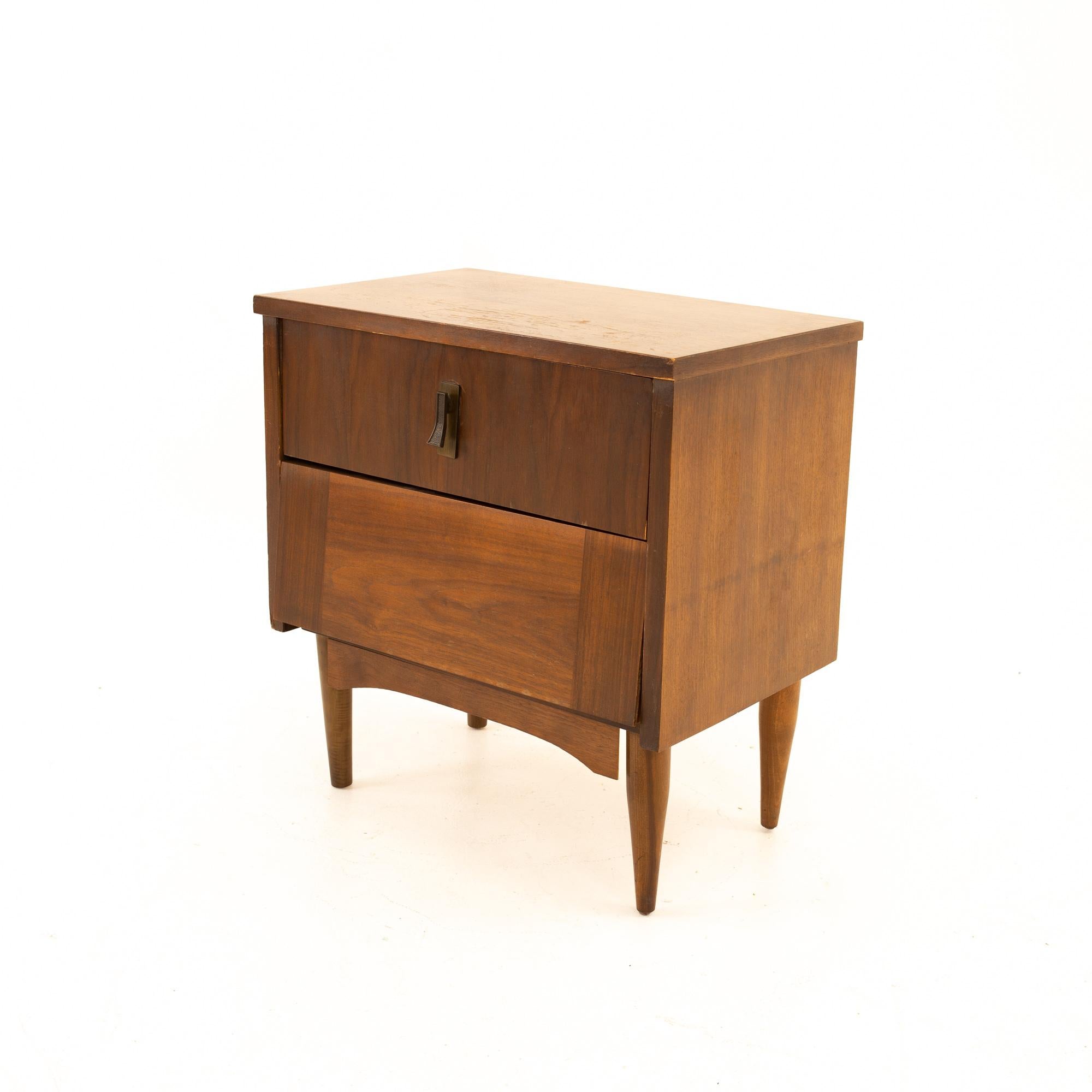 Mid Century Walnut Nightstand

Nightstand measures: 21.75 wide x 14 deep x 23.25 high

All pieces of furniture can be had in what we call restored vintage condition. That means the piece is restored upon purchase so it’s free of watermarks,