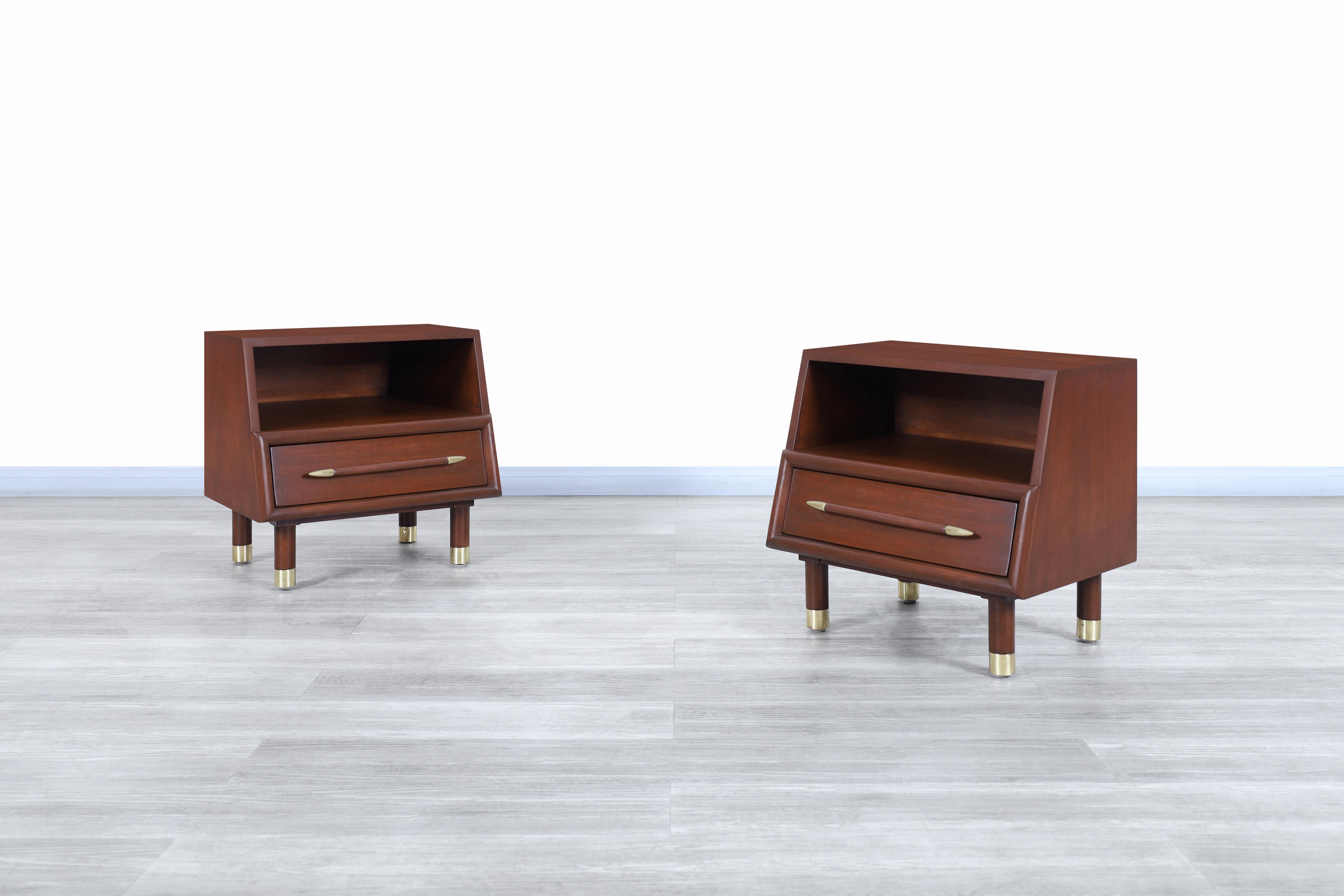Fabulous midcentury walnut nightstands designed by John Keal for Brown Saltman in the United States, circa 1950s. These nightstands have a very particular and avant-garde geometric design. Each nightstand has been built from the highest quality