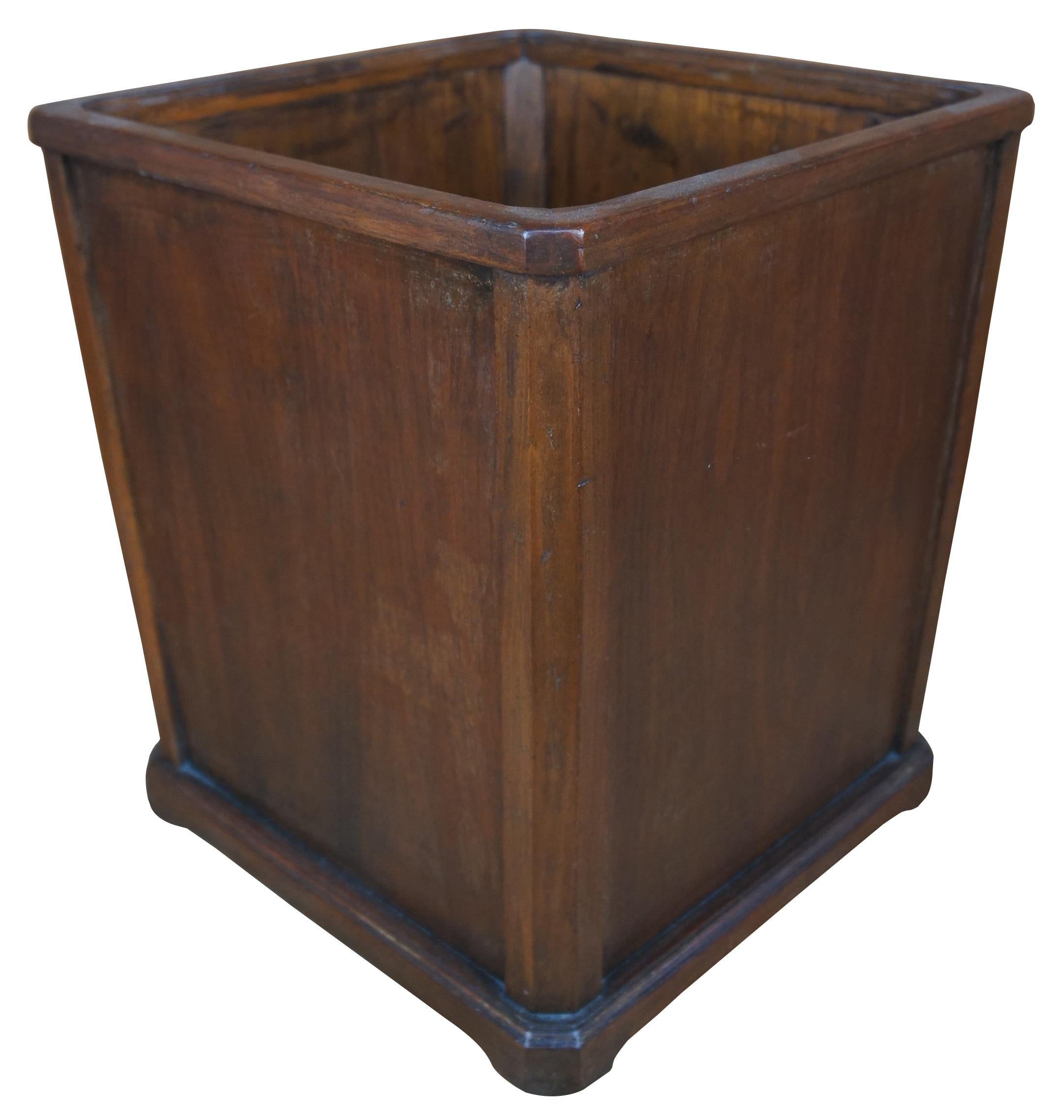 Large mid century modern executive desk walnut waste basket or wood trash can with square tapered form, attributed to Nucraft. Founded in Grand Rapids, Michigan, in 1945 by George W. Schad, Nucraft’s early days were built upon an idea to craft solid