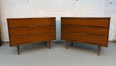 Mid-Century Walnut Sculpted Pull Three Drawer Dresser Pair