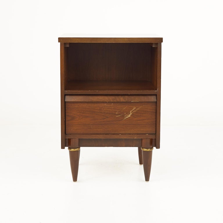 Mid century walnut single drawer nightstand

The nightstand measures: 17.75 wide x 13.25 deep x 26.25 inches high

All pieces of furniture can be had in what we call restored vintage condition. That means the piece is restored upon purchase so
