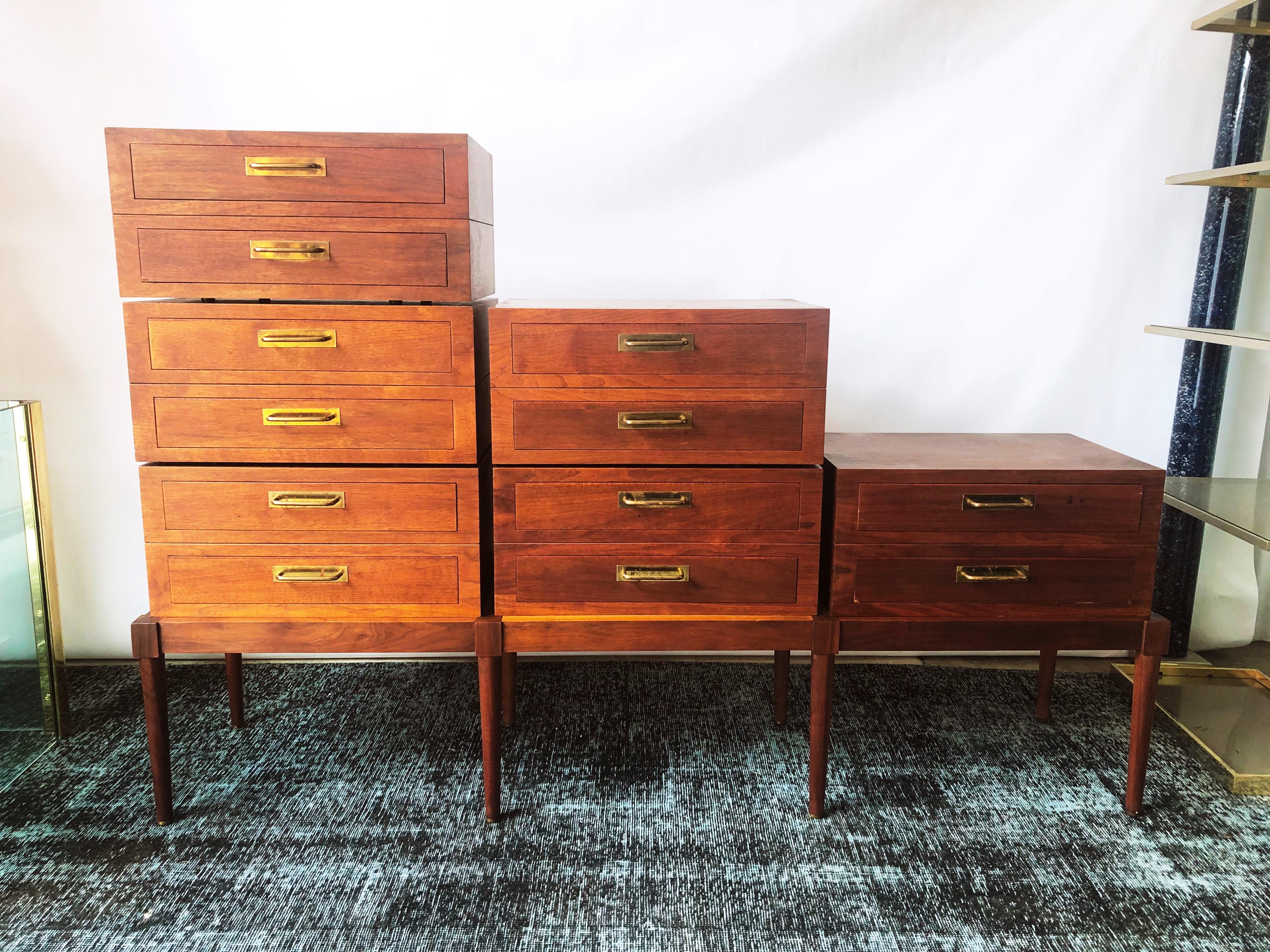 This mid-century modern six-piece walnut modular drawer set is in overall good condition and wear consistent with age and use.  These six piece units can be arranged in multiple variations. (Shown in photos).  Beautifully aged brass hardware.