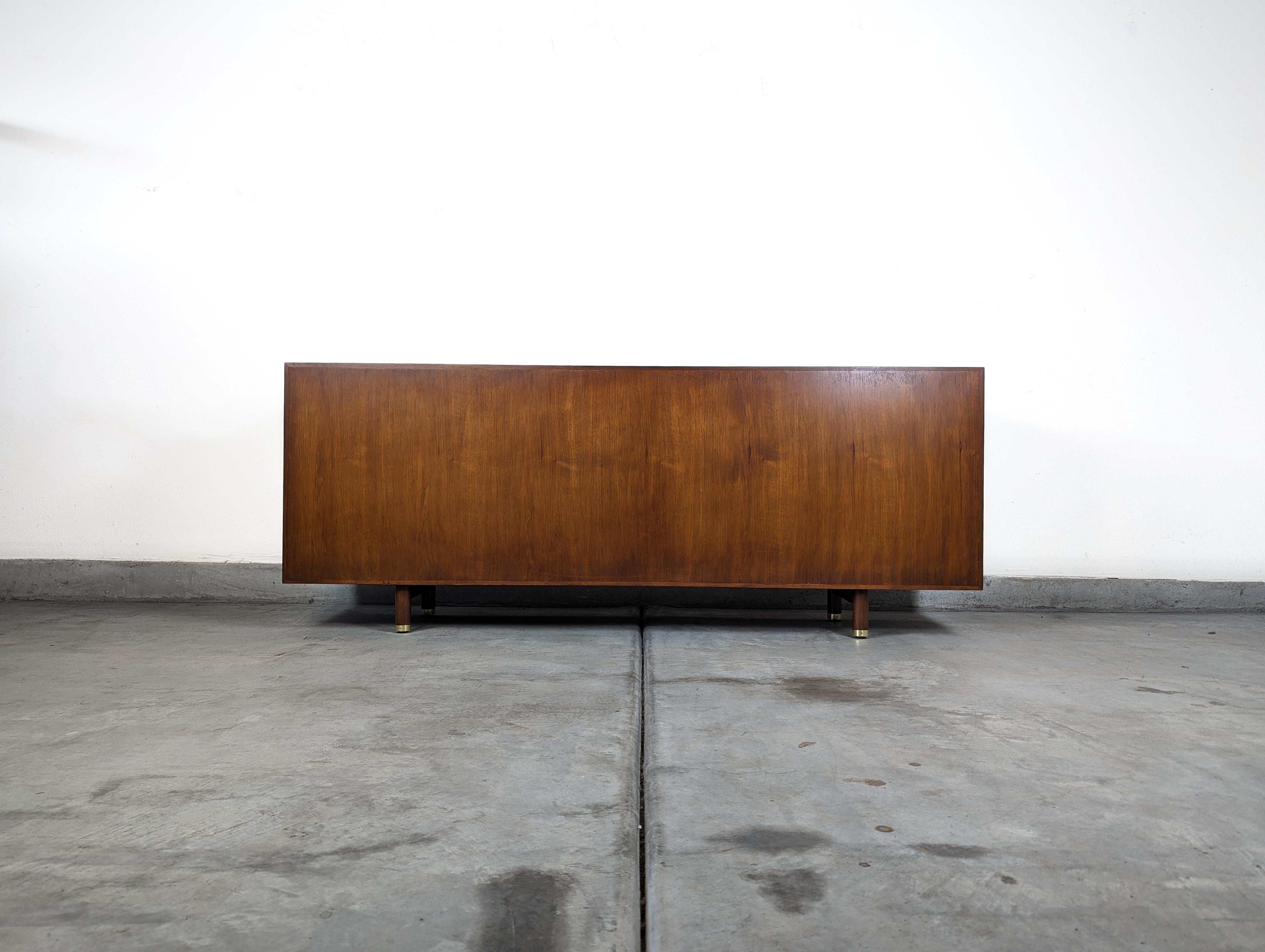 Leather Mid Century Walnut Sliding Door Credenza by Edward Wormley for Dunbar, c1960s For Sale