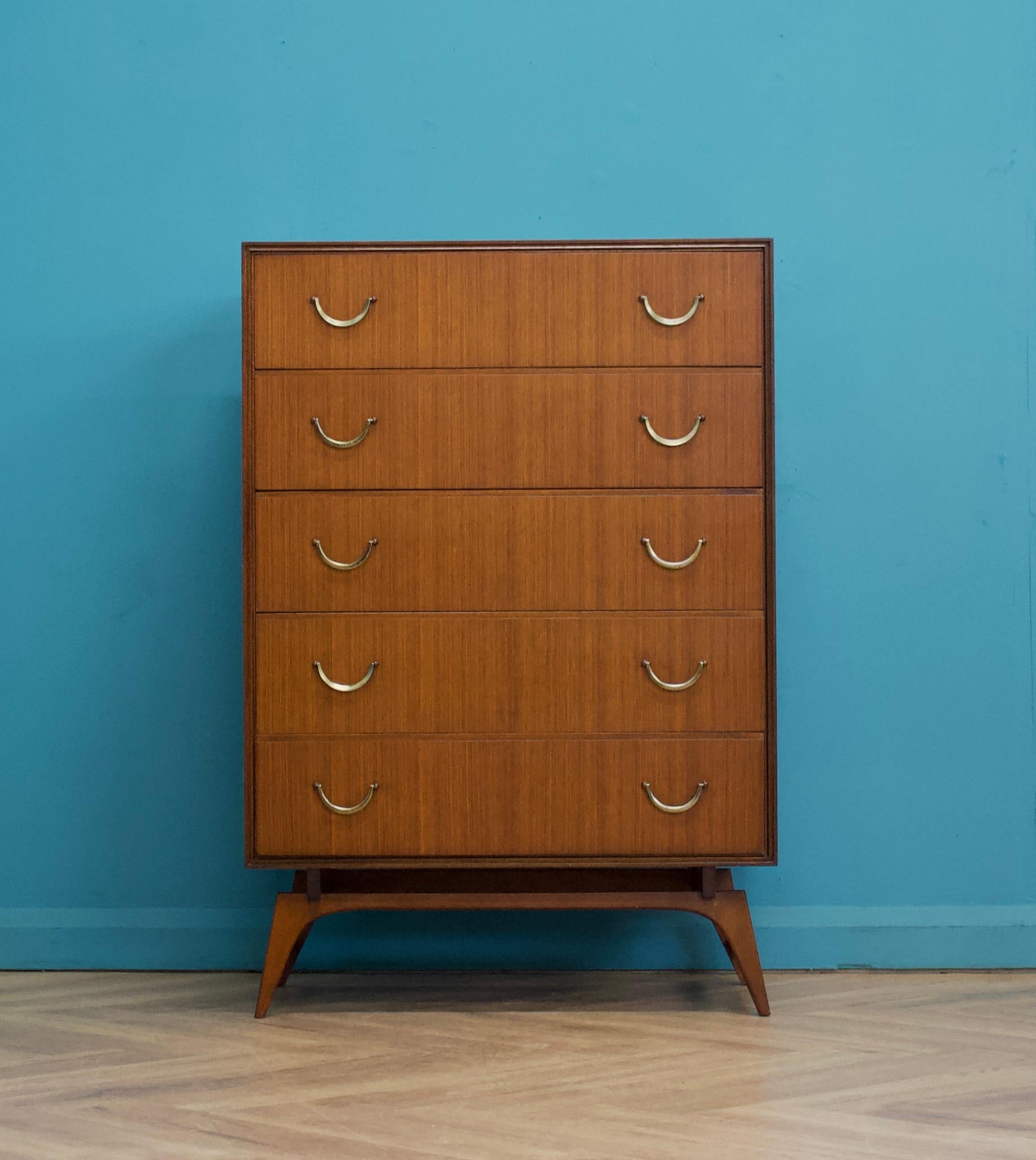 A walnut chest of drawers from Meredew
There are five drawers with metal handles


The matching wardrobe is available to purchase on a separate listing