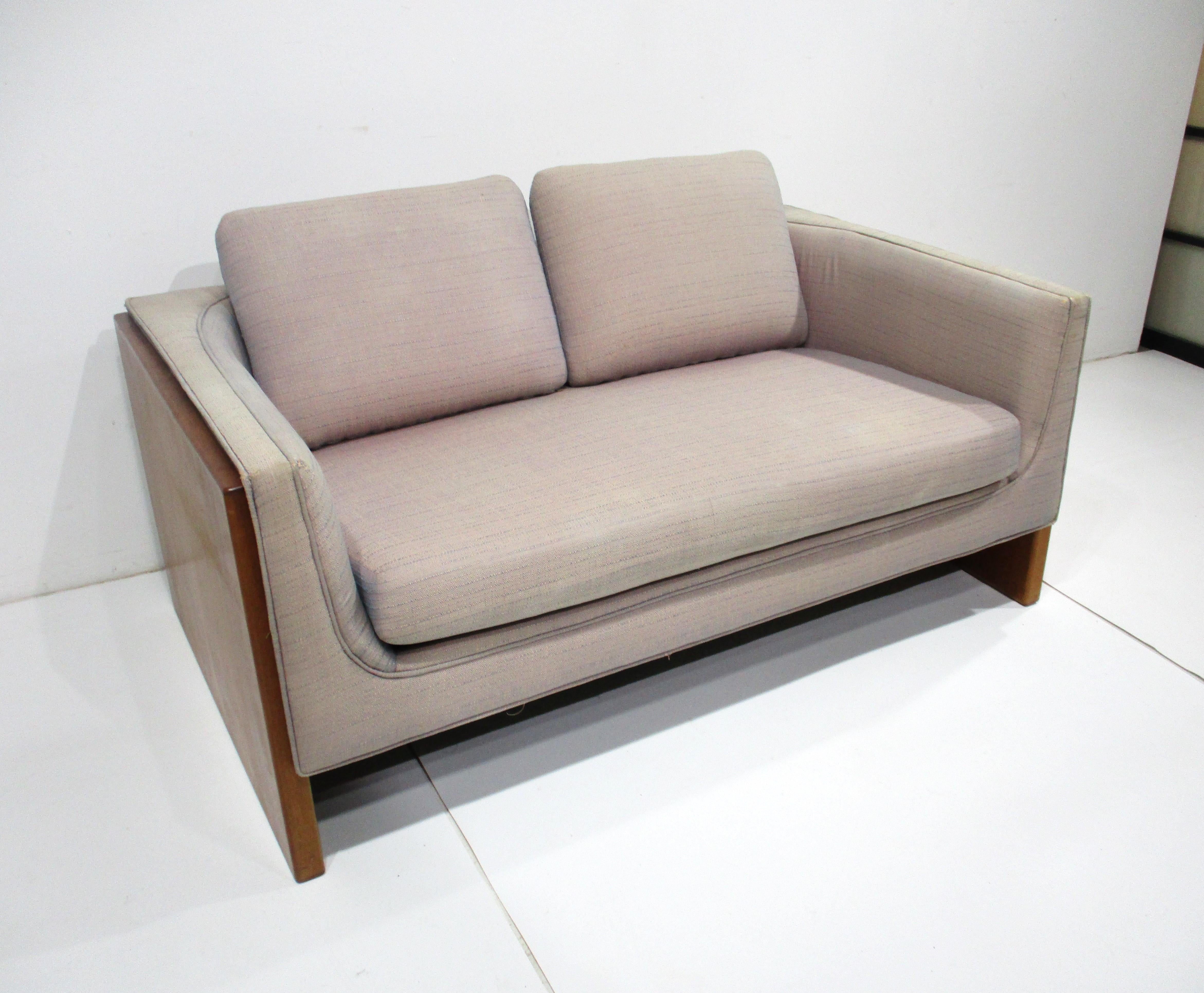 Mid-Century Modern Mid Century Walnut Upholstered Loveseat in the style of Milo Baughman  For Sale